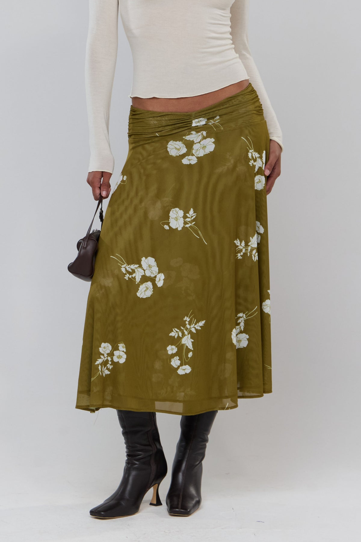 This is an image of Abby in Moss - RESA featuring a model wearing the dress