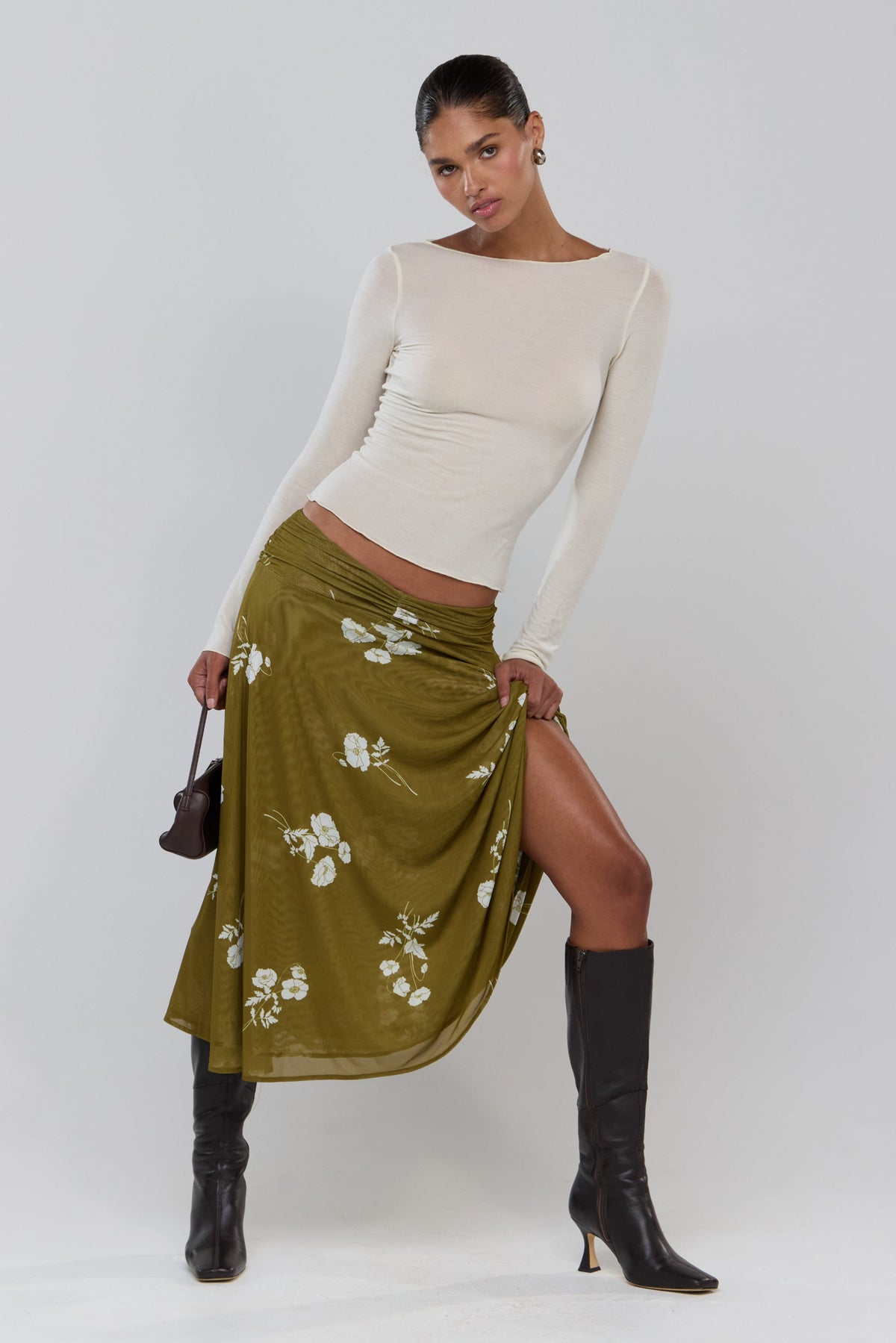 This is an image of Abby in Moss - RESA featuring a model wearing the dress