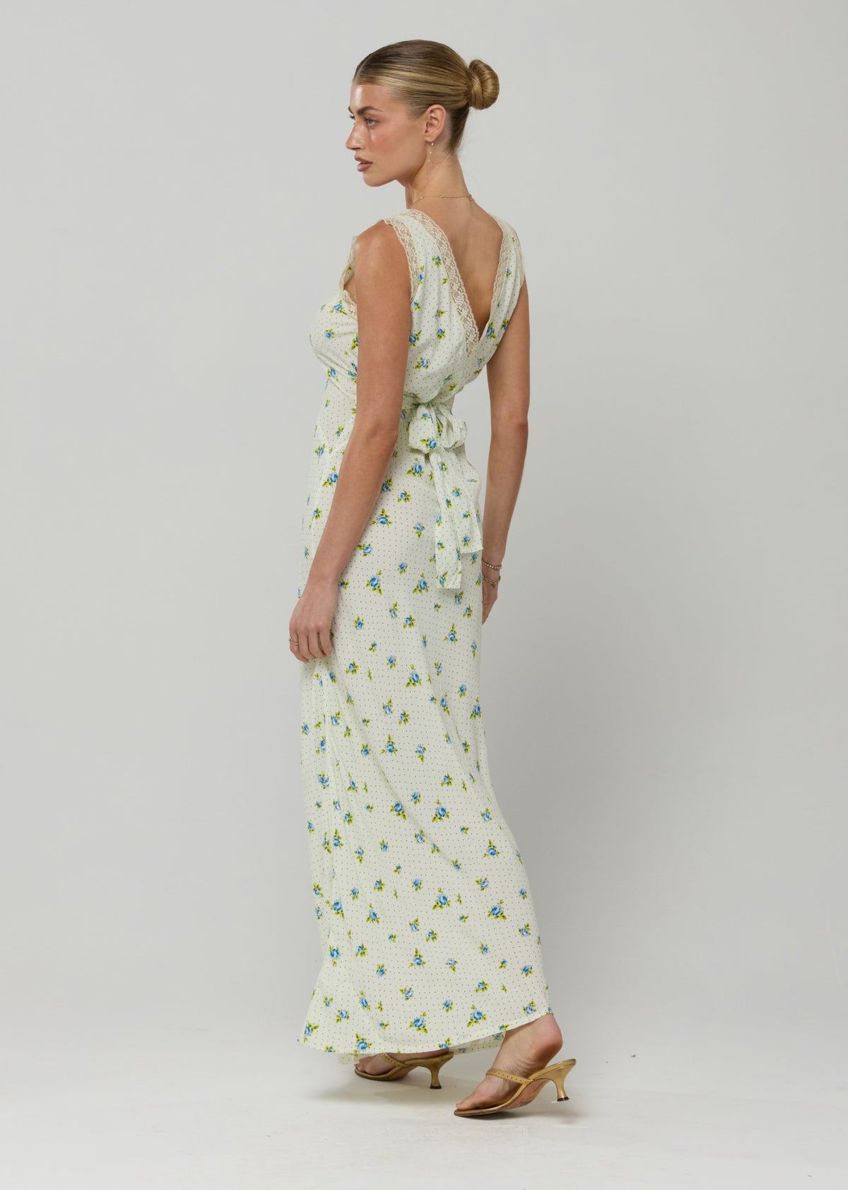 This is an image of Aimee Dress in Bluebell - RESA featuring a model wearing the dress