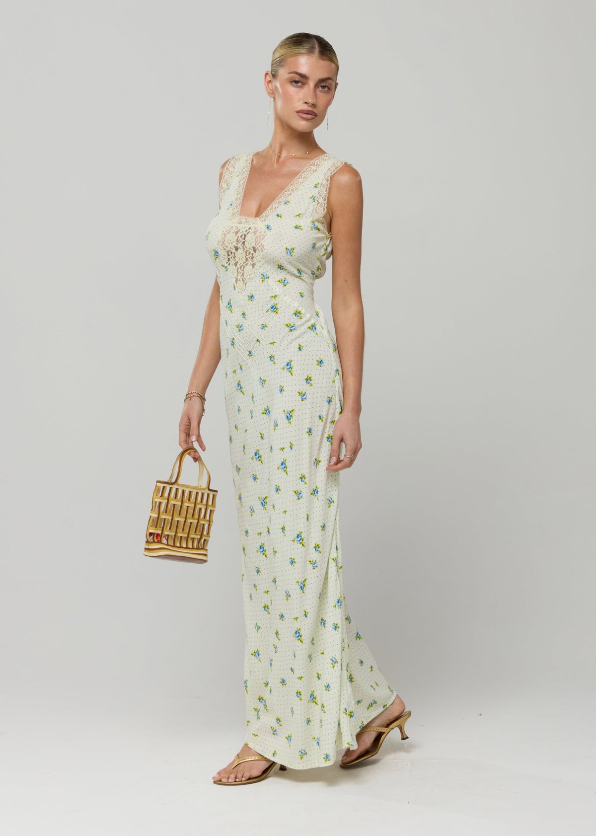 This is an image of Aimee Dress in Bluebell - RESA featuring a model wearing the dress