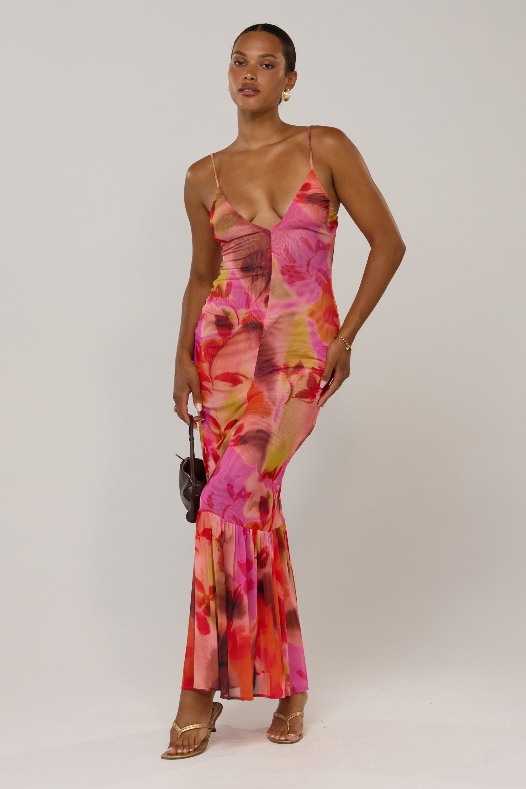 This is an image of Alejandra in Lilikoi - RESA featuring a model wearing the dress