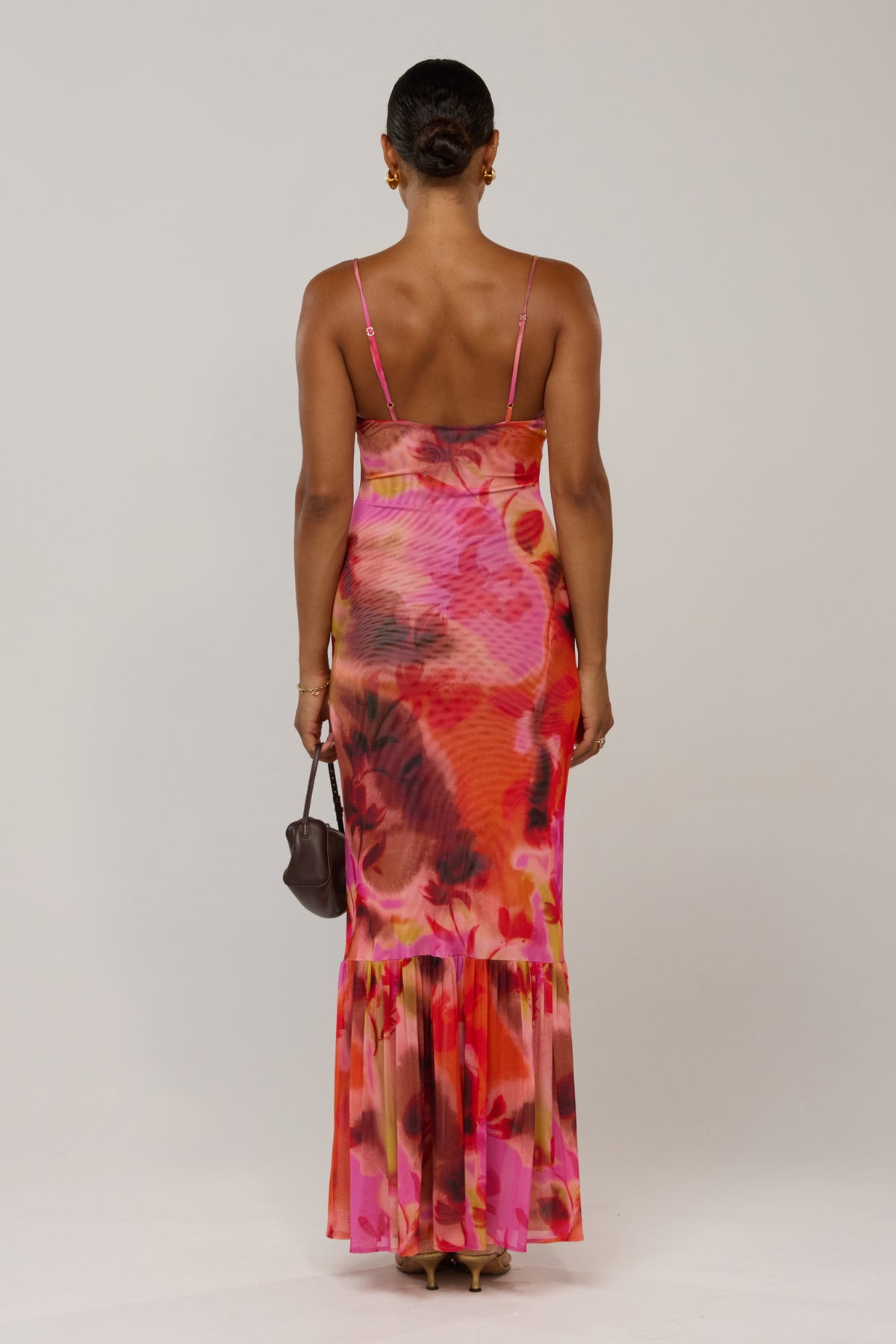 This is an image of Alejandra in Lilikoi - RESA featuring a model wearing the dress