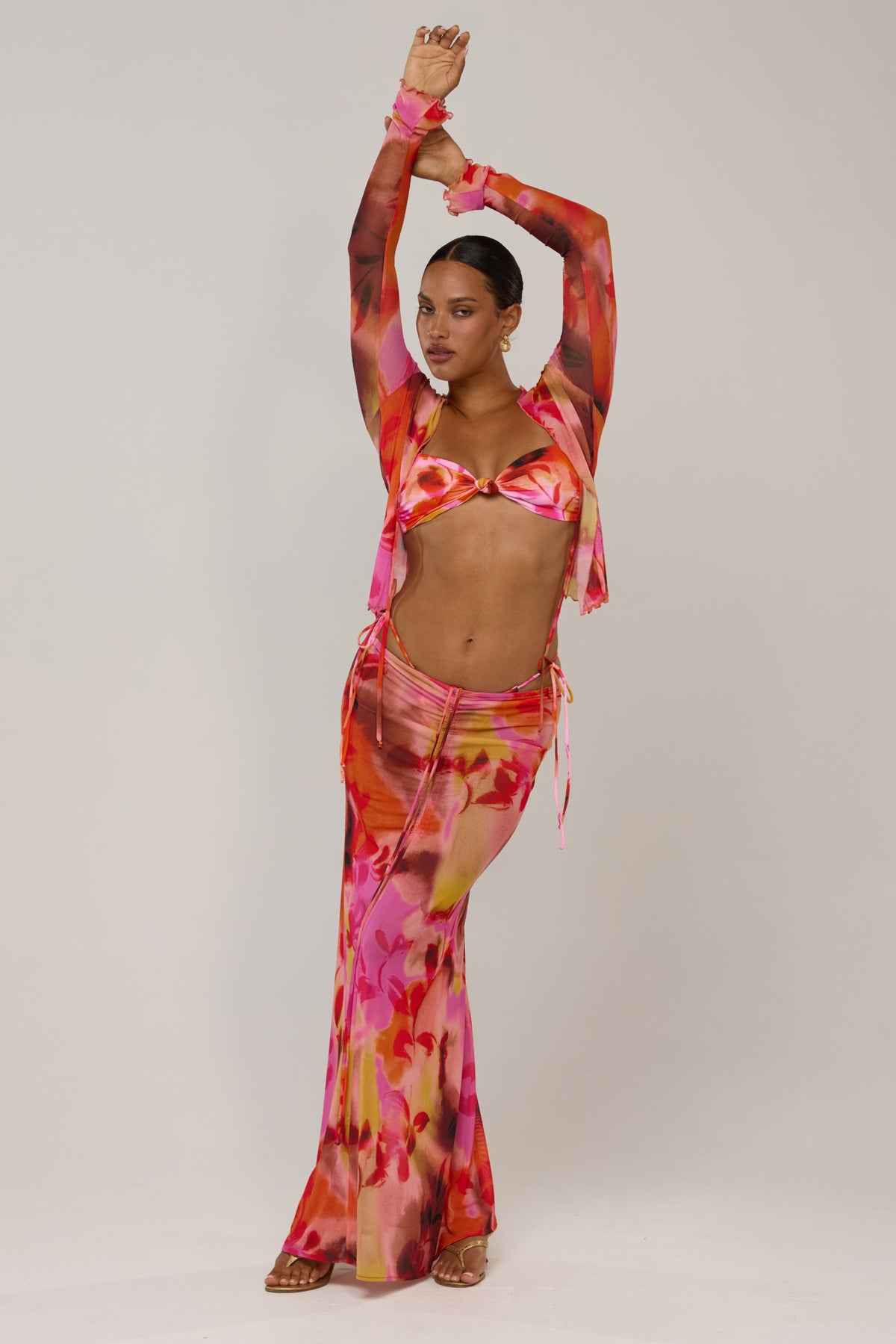 This is an image of Aliyah in Lilikoi - RESA featuring a model wearing the dress