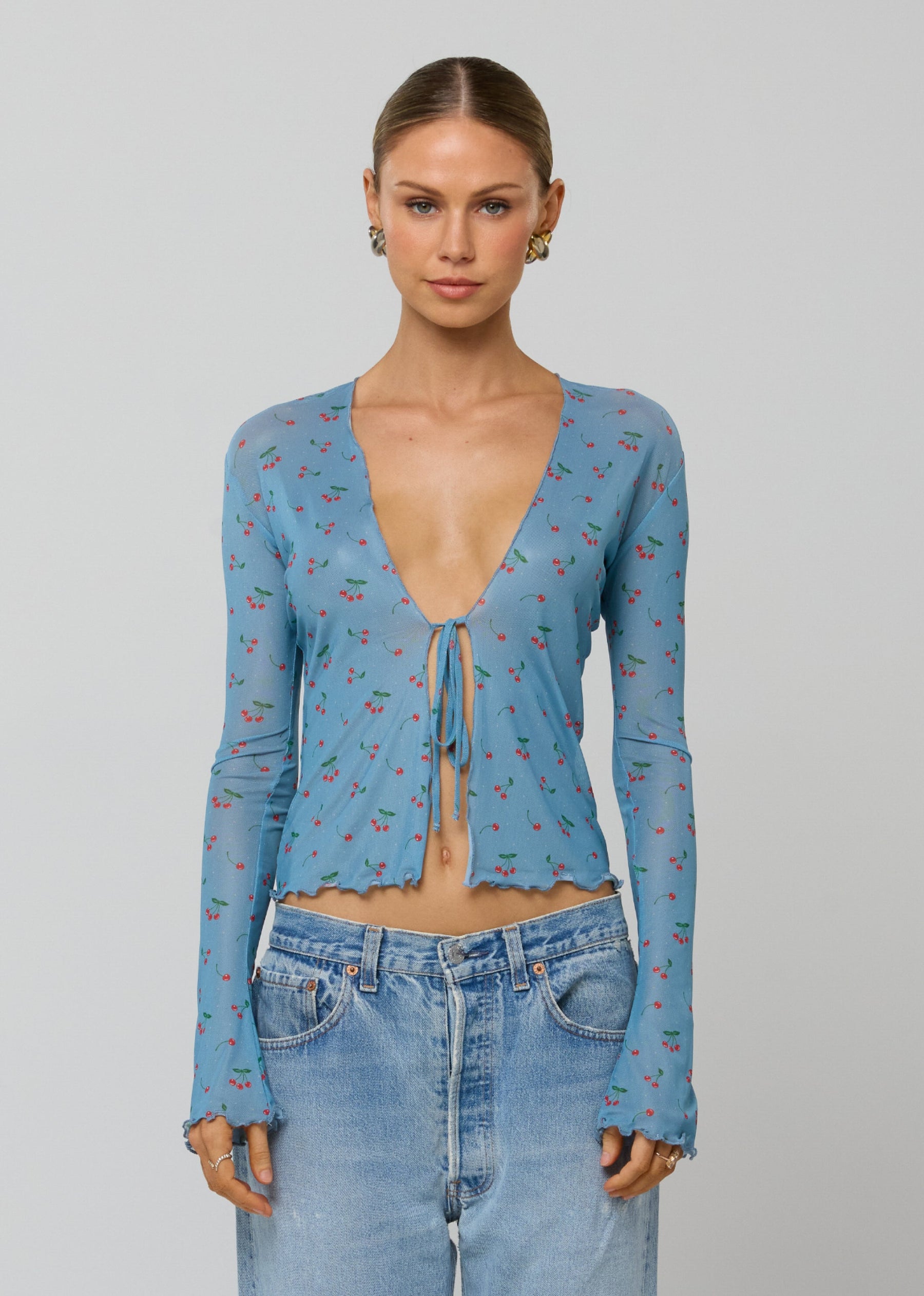 This is an image of Aliyah Mesh Top in Fizz - RESA featuring a model wearing the dress