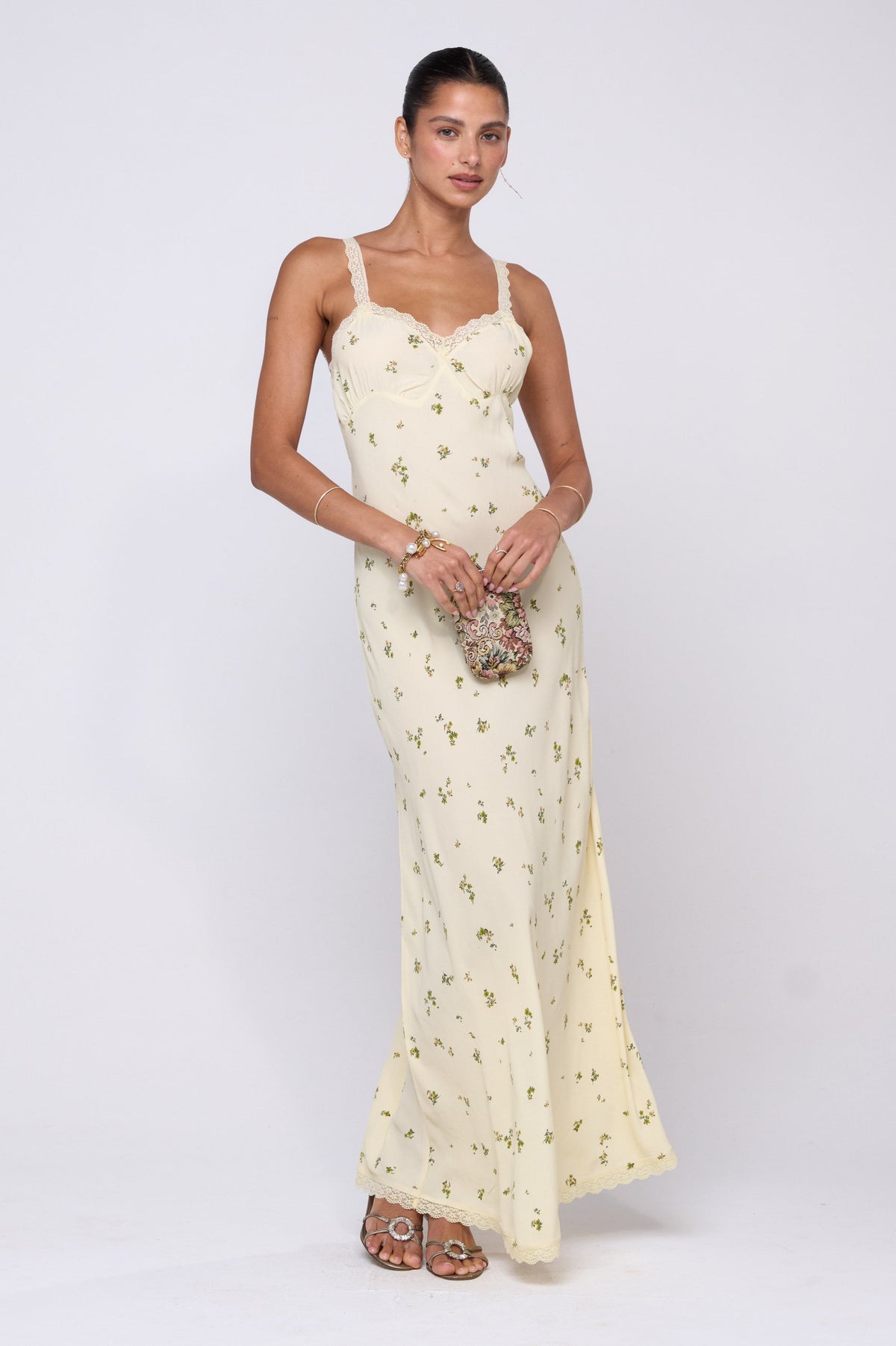 This is an image of Anais Dress in Beurre - RESA featuring a model wearing the dress