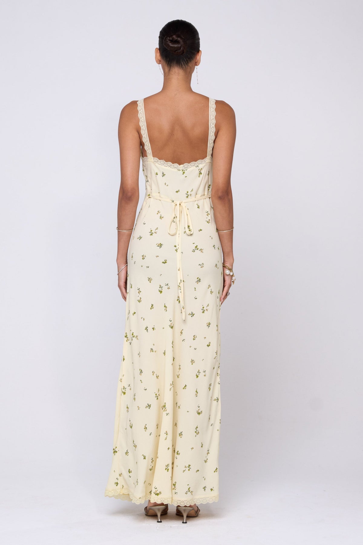 This is an image of Anais Dress in Beurre - RESA featuring a model wearing the dress
