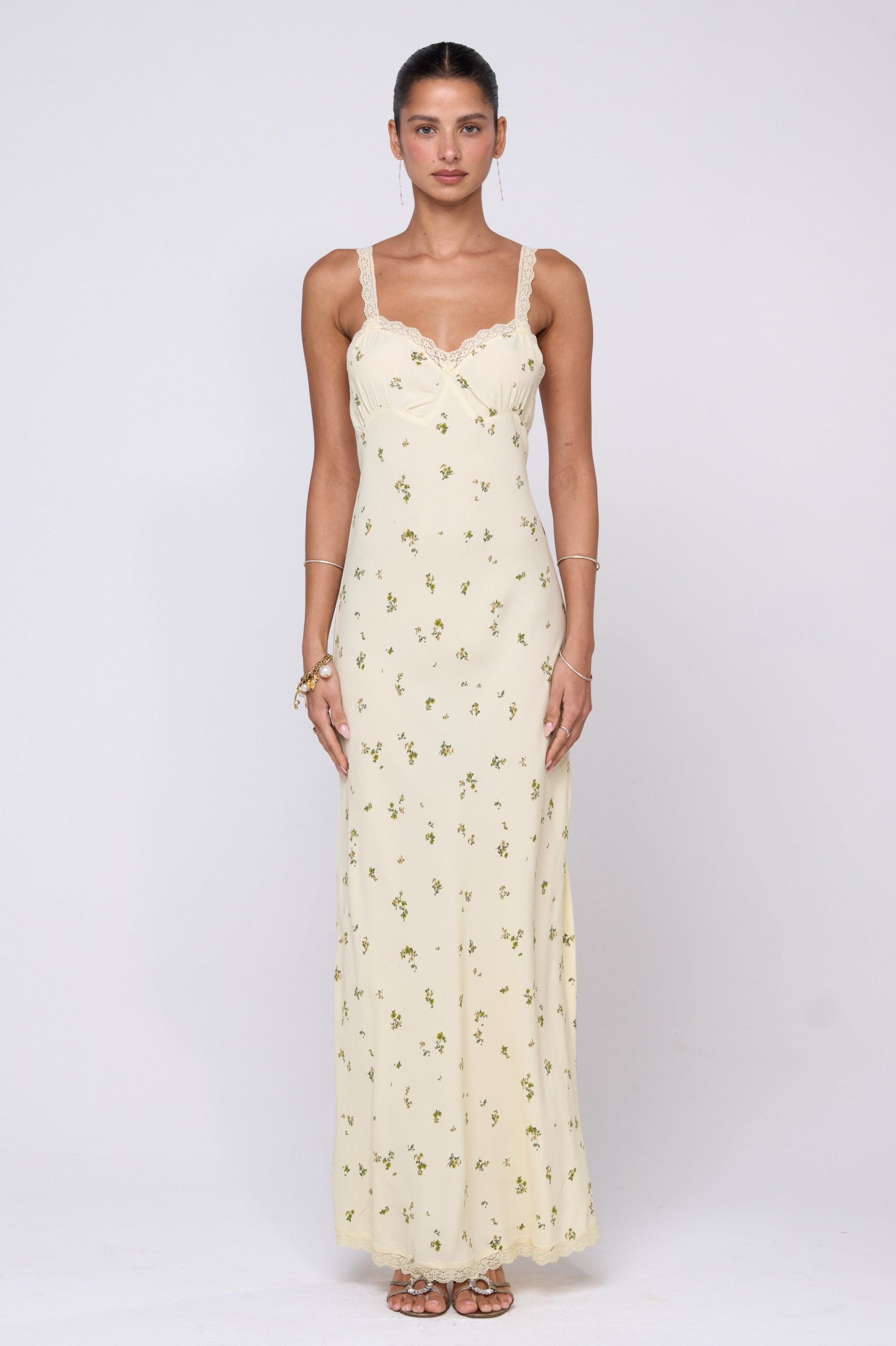 This is an image of Anais Dress in Beurre - RESA featuring a model wearing the dress