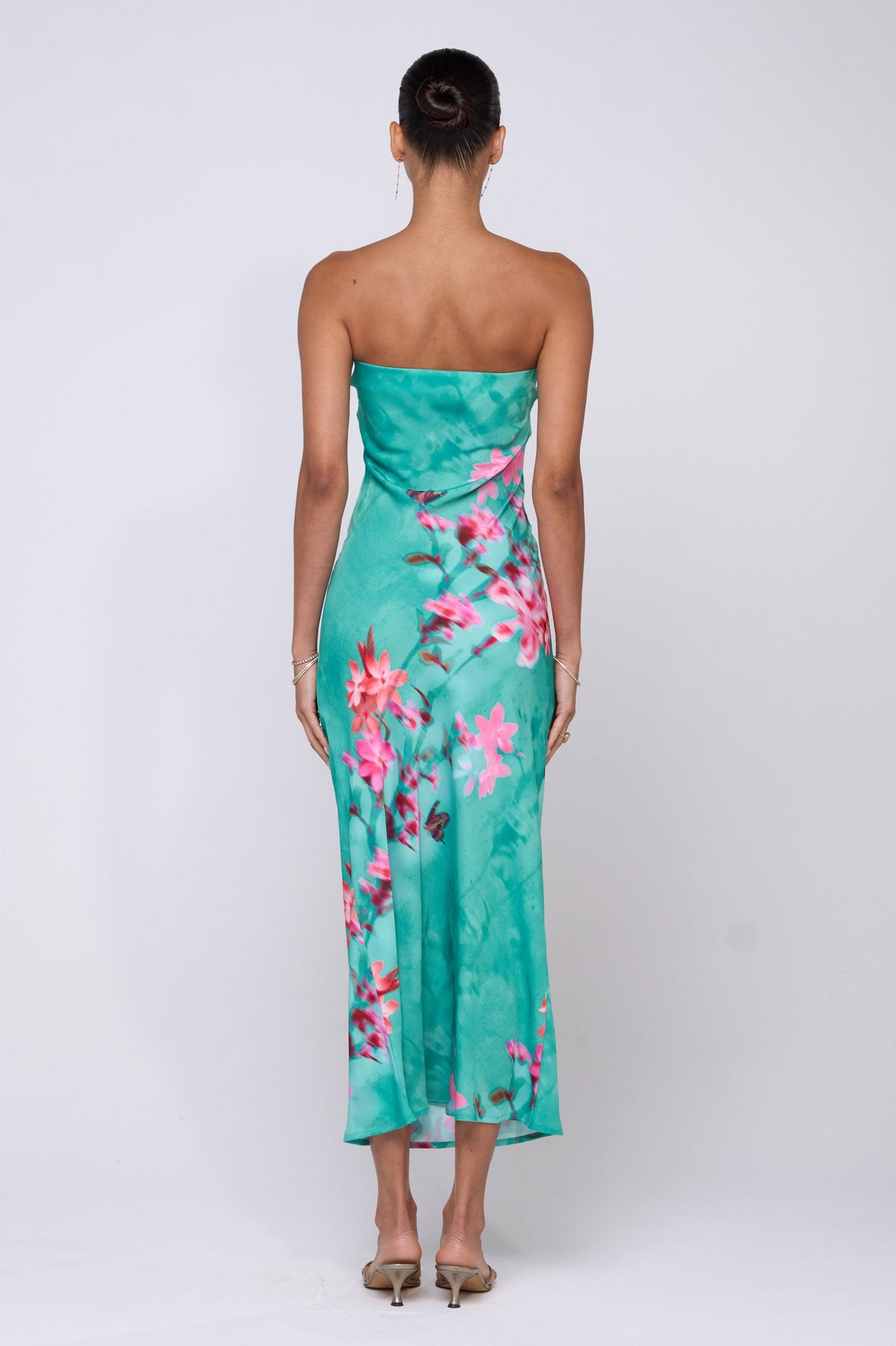 This is an image of Anna Slip in Clearwater - RESA featuring a model wearing the dress