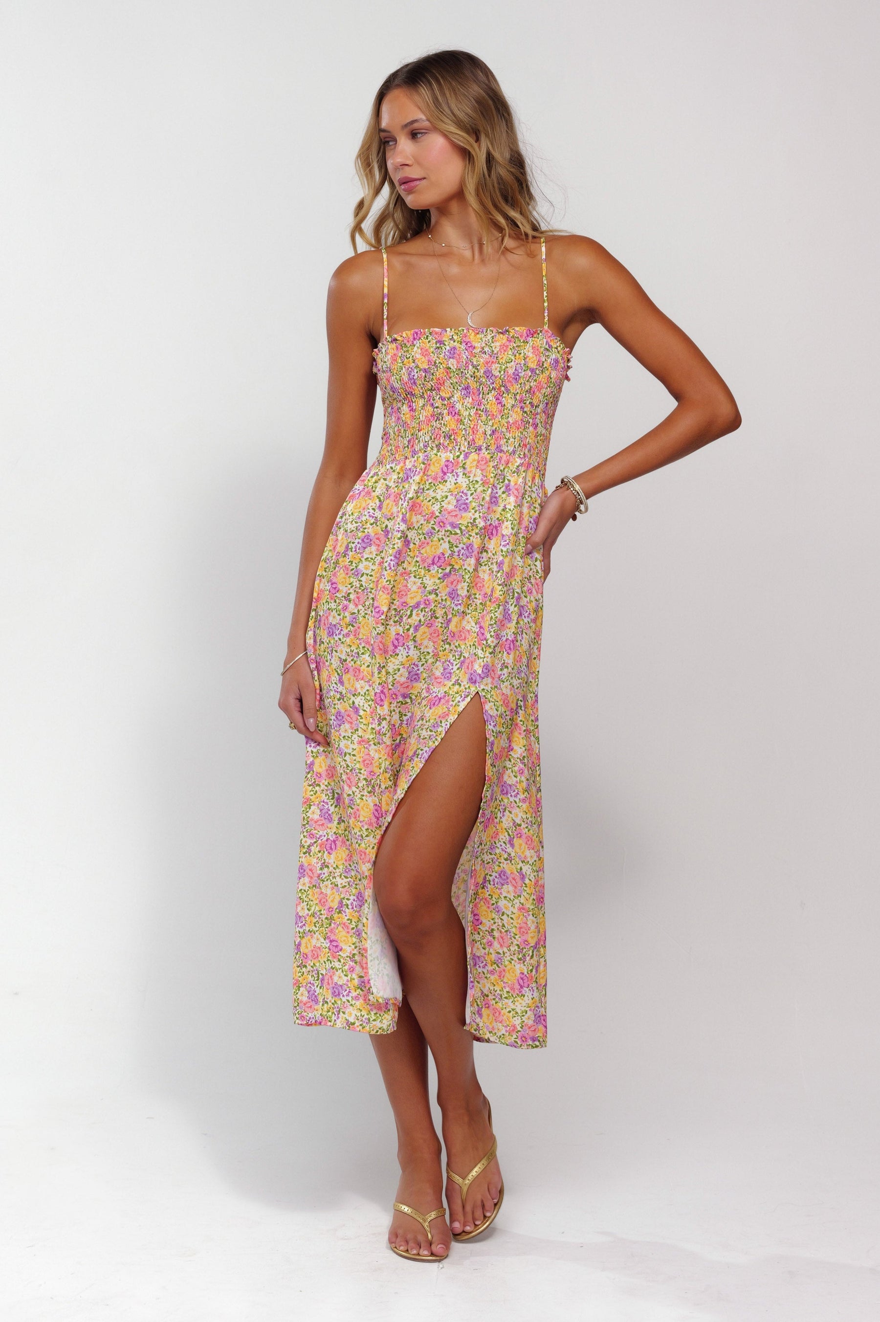 This is an image of Ashley Midi in April - RESA featuring a model wearing the dress