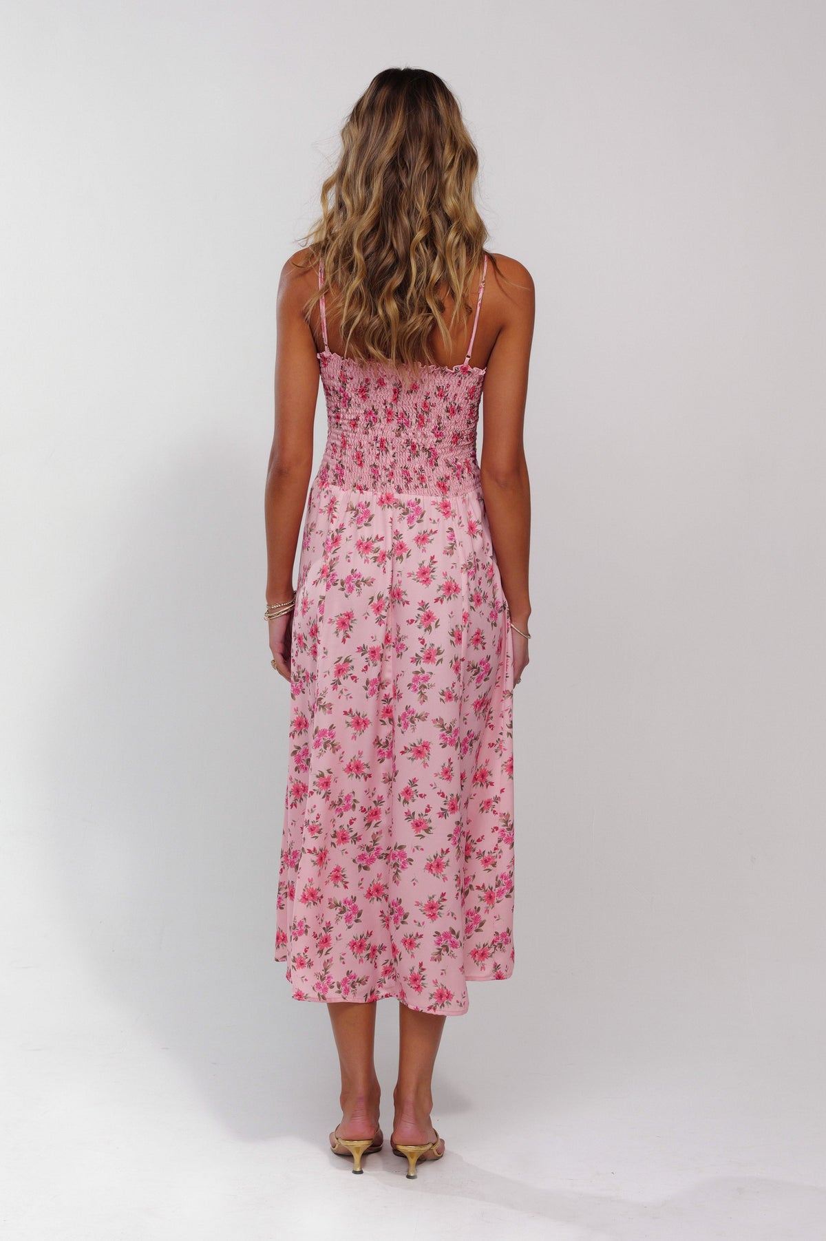 This is an image of Ashley Midi in Ojai - RESA featuring a model wearing the dress