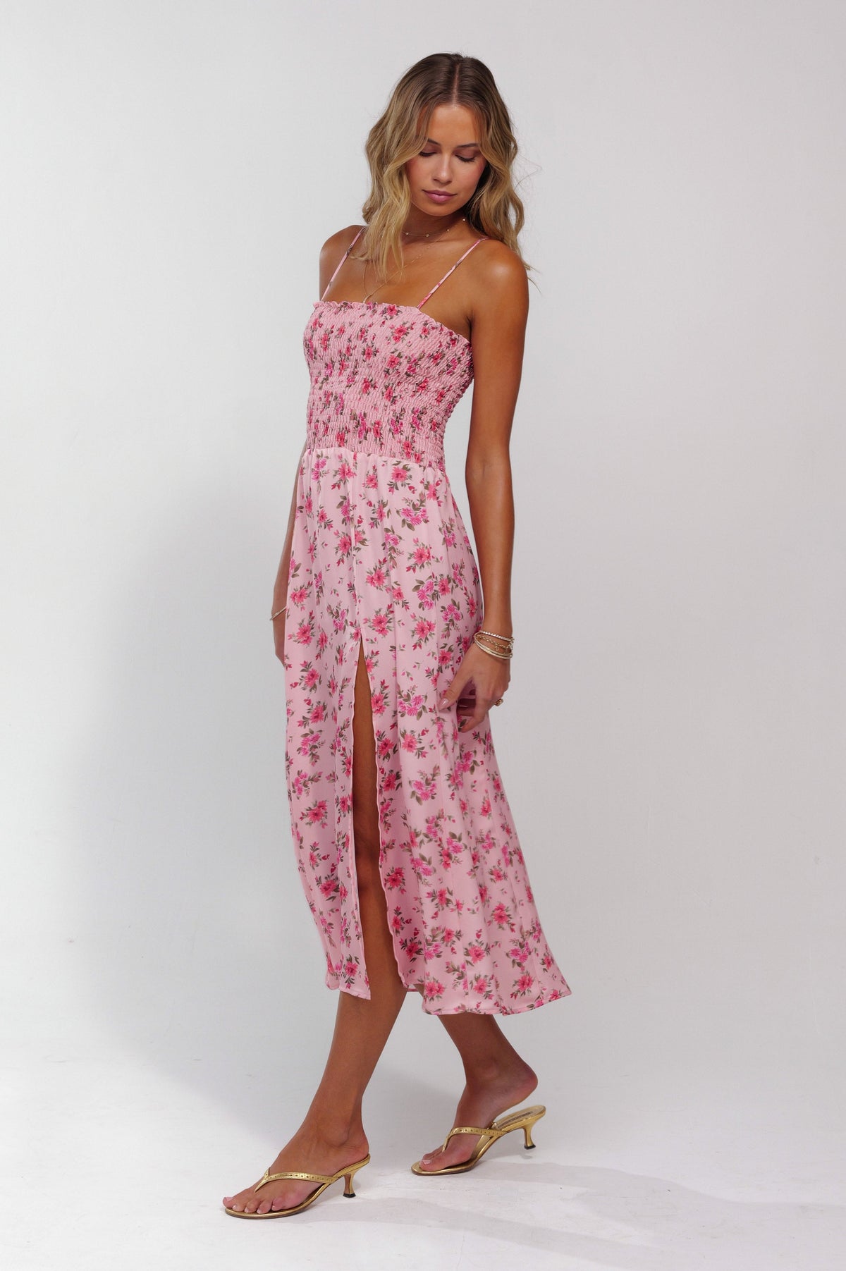 This is an image of Ashley Midi in Ojai - RESA featuring a model wearing the dress