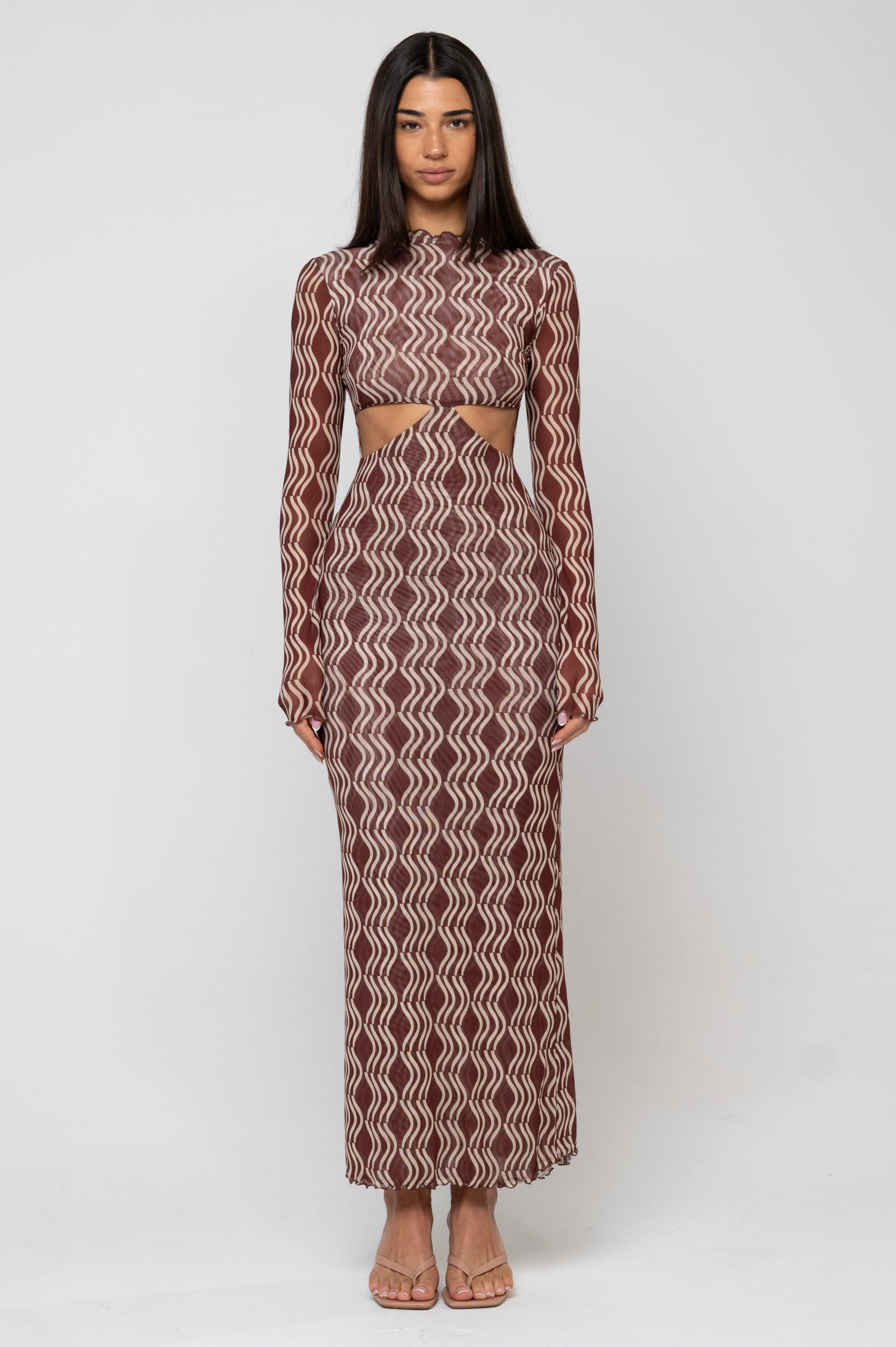 This is an image of Audrey Dress in Coco - RESA featuring a model wearing the dress
