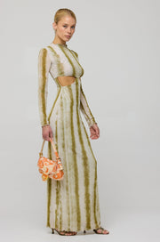 This is an image of Audrey Dress in Dune - RESA featuring a model wearing the dress