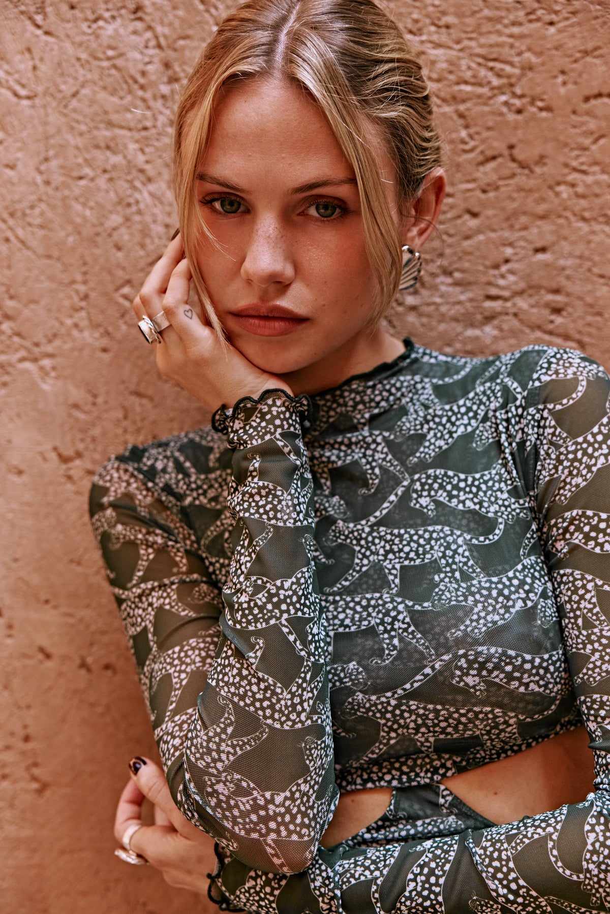 This is an image of Audrey Dress in Puma - RESA featuring a model wearing the dress