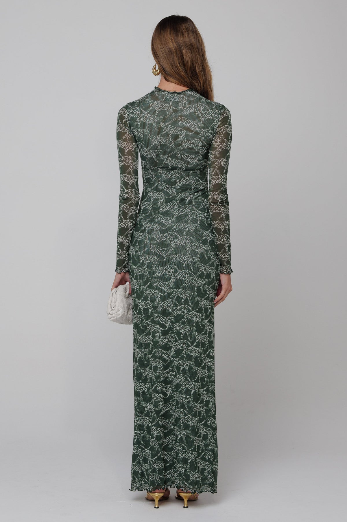This is an image of Audrey Dress in Puma - RESA featuring a model wearing the dress