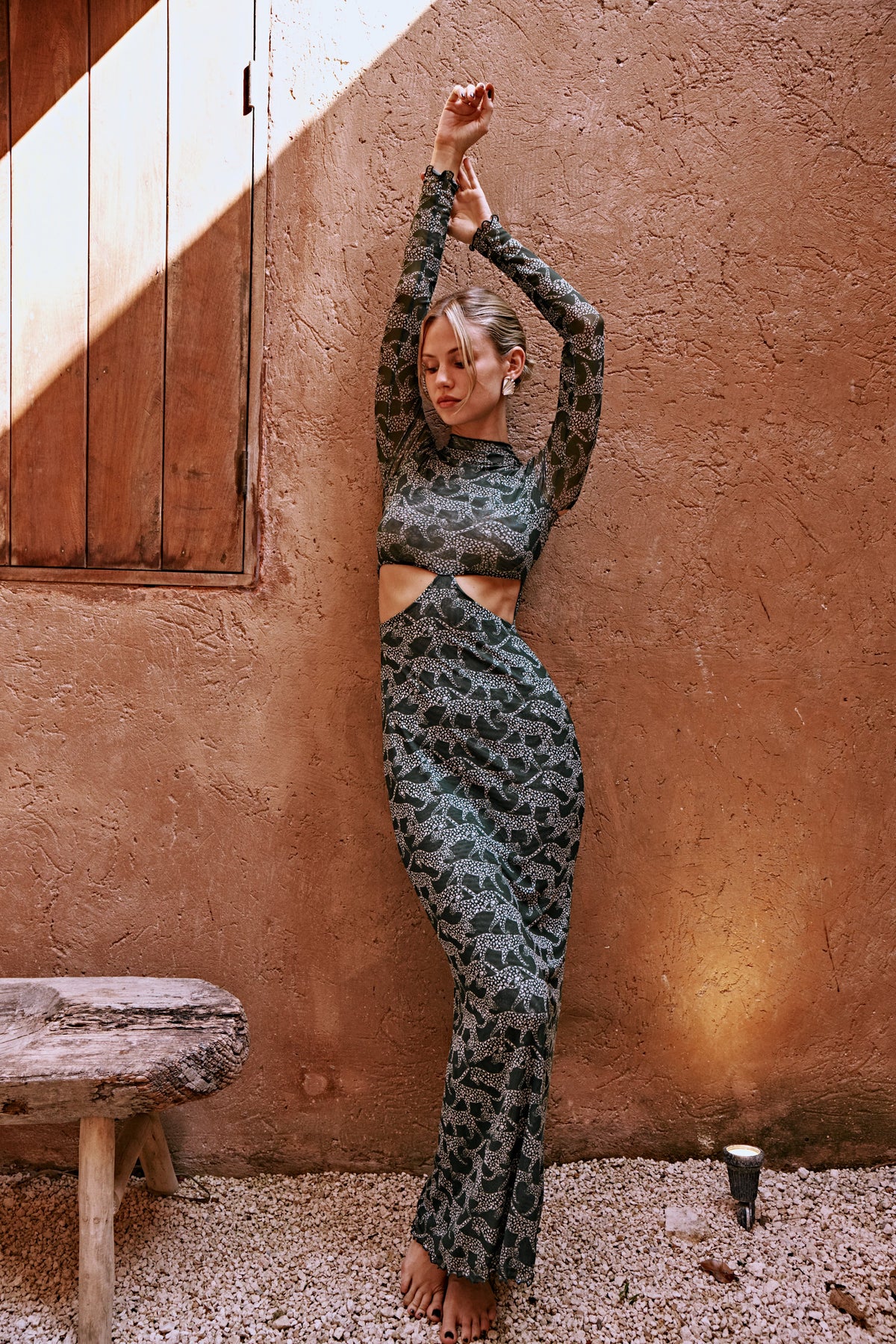 This is an image of Audrey Dress in Puma - RESA featuring a model wearing the dress