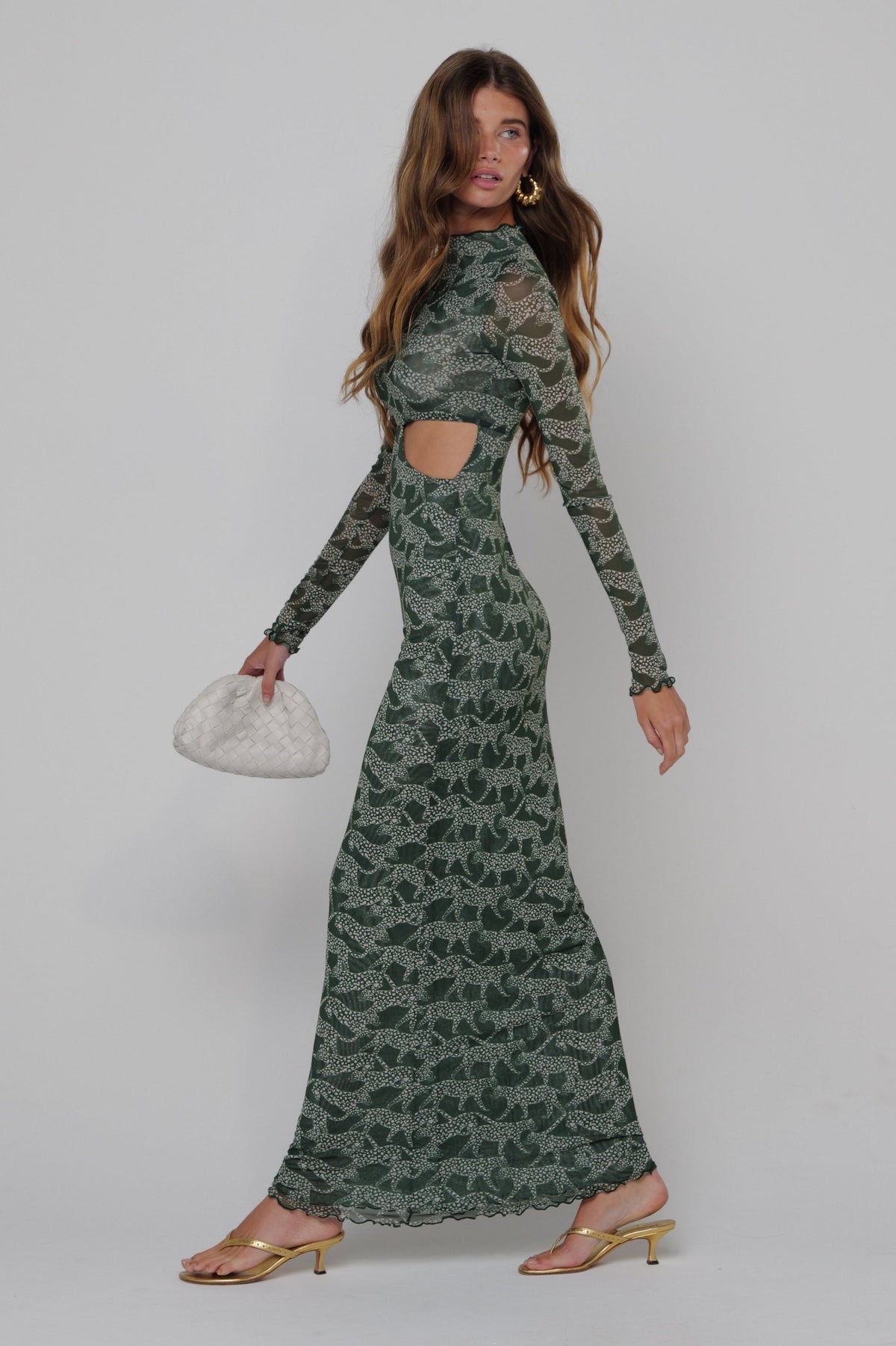 This is an image of Audrey Dress in Puma - RESA featuring a model wearing the dress