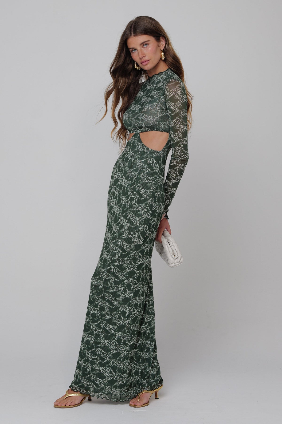 This is an image of Audrey Dress in Puma - RESA featuring a model wearing the dress