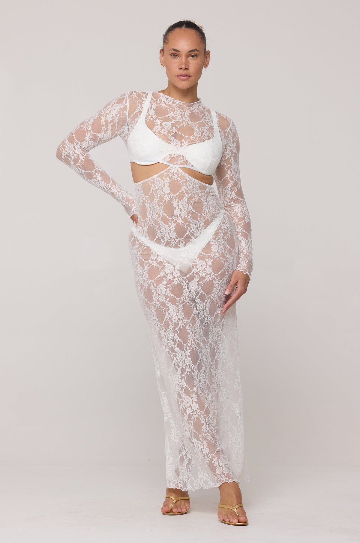 This is an image of Audrey Lace Dress in White Lace - RESA featuring a model wearing the dress