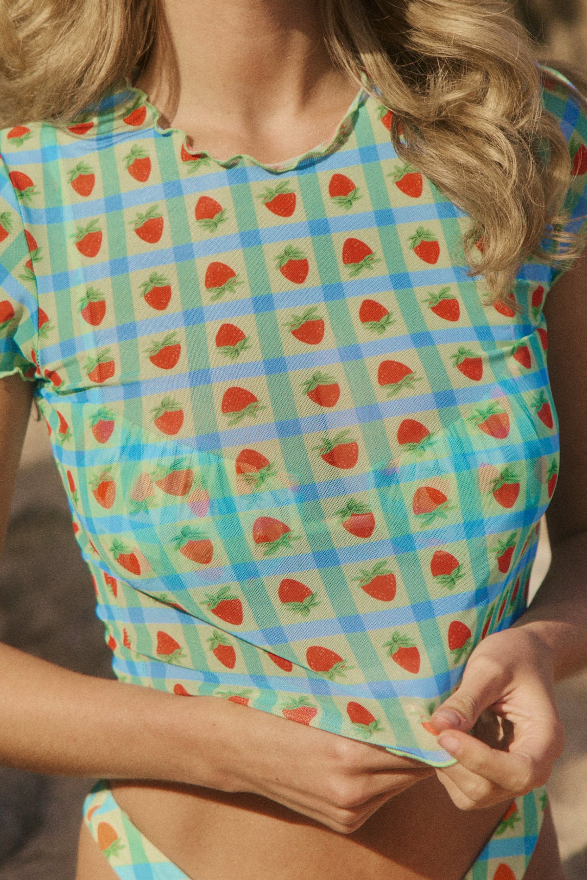This is an image of Baby Tee Mesh in Juicy - RESA featuring a model wearing the dress