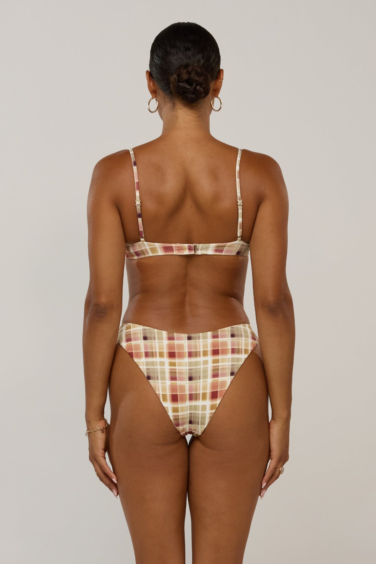 This is an image of Beau Bikini Bottom in Drift - RESA featuring a model wearing the dress