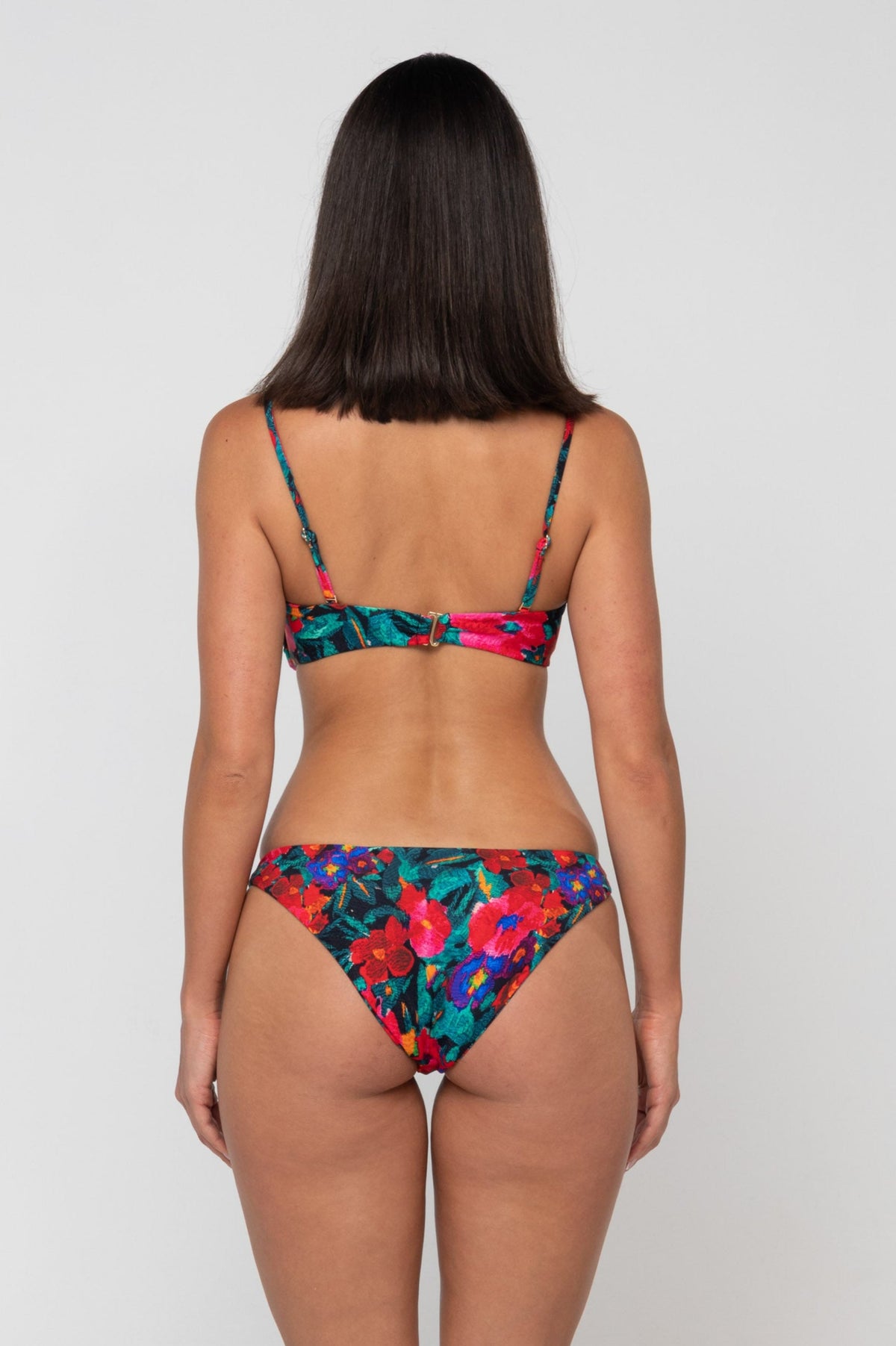 This is an image of Beau Bikini Bottom in Resort - RESA featuring a model wearing the dress