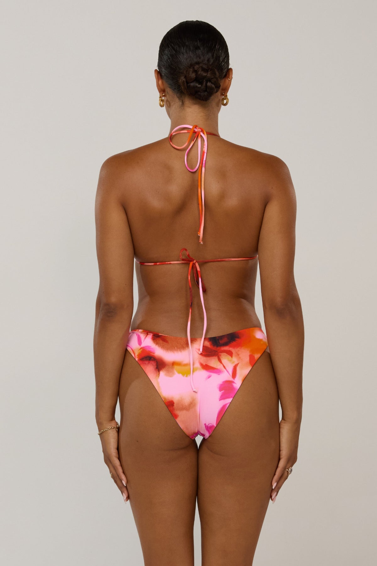 This is an image of Beau in Lilikoi - RESA featuring a model wearing the dress