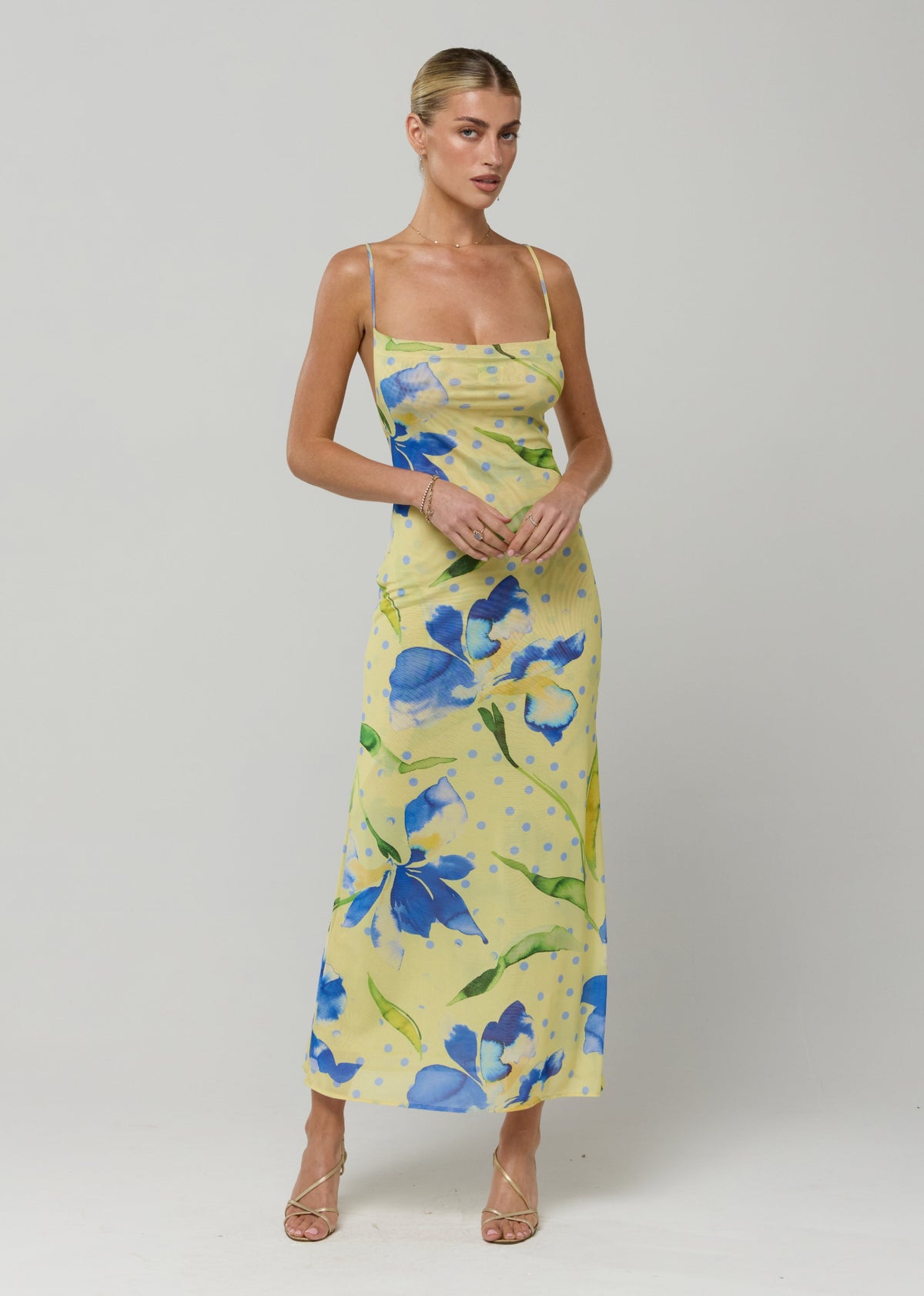 This is an image of Berri Midi in Solei - RESA featuring a model wearing the dress