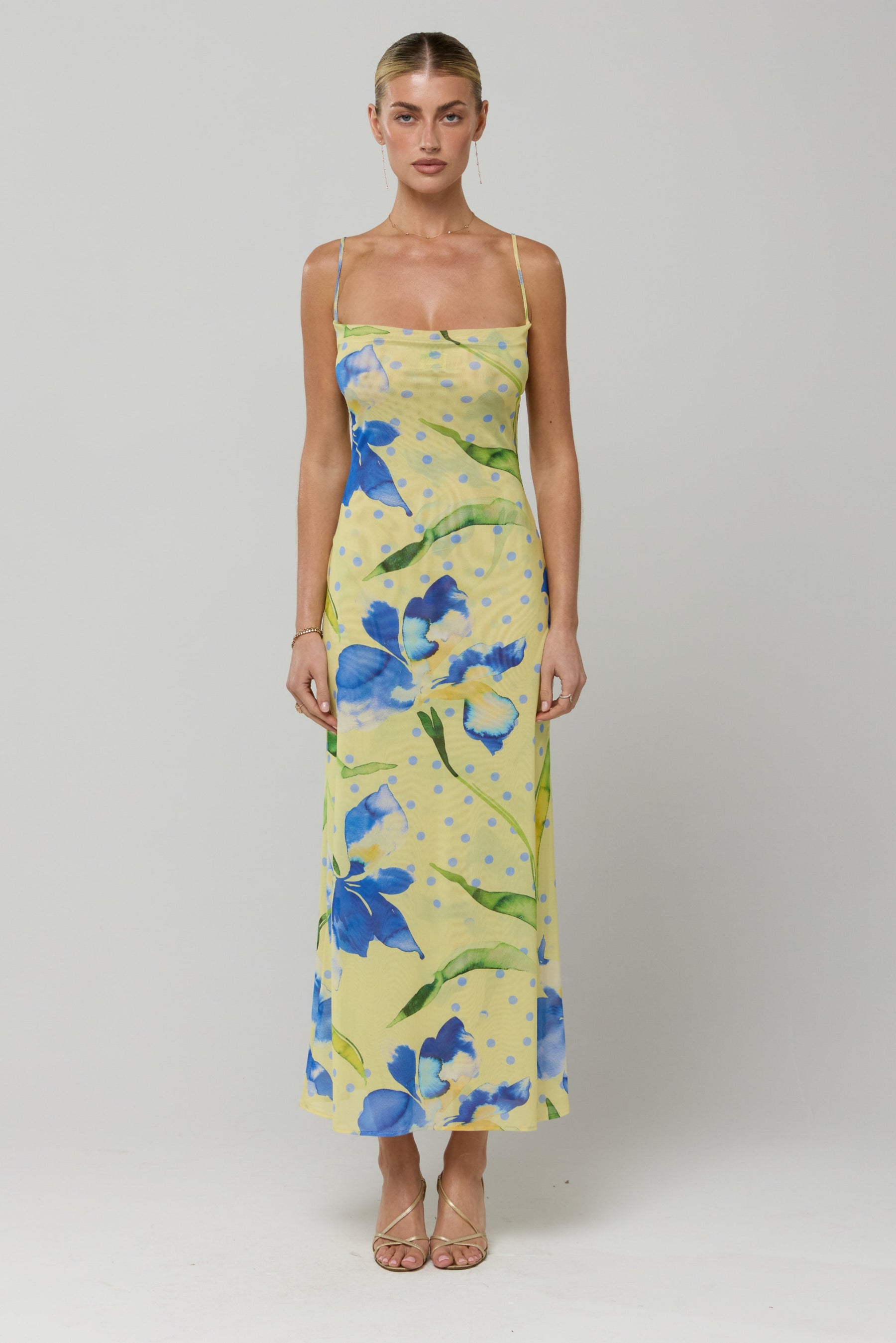 This is an image of Berri Midi in Solei - RESA featuring a model wearing the dress