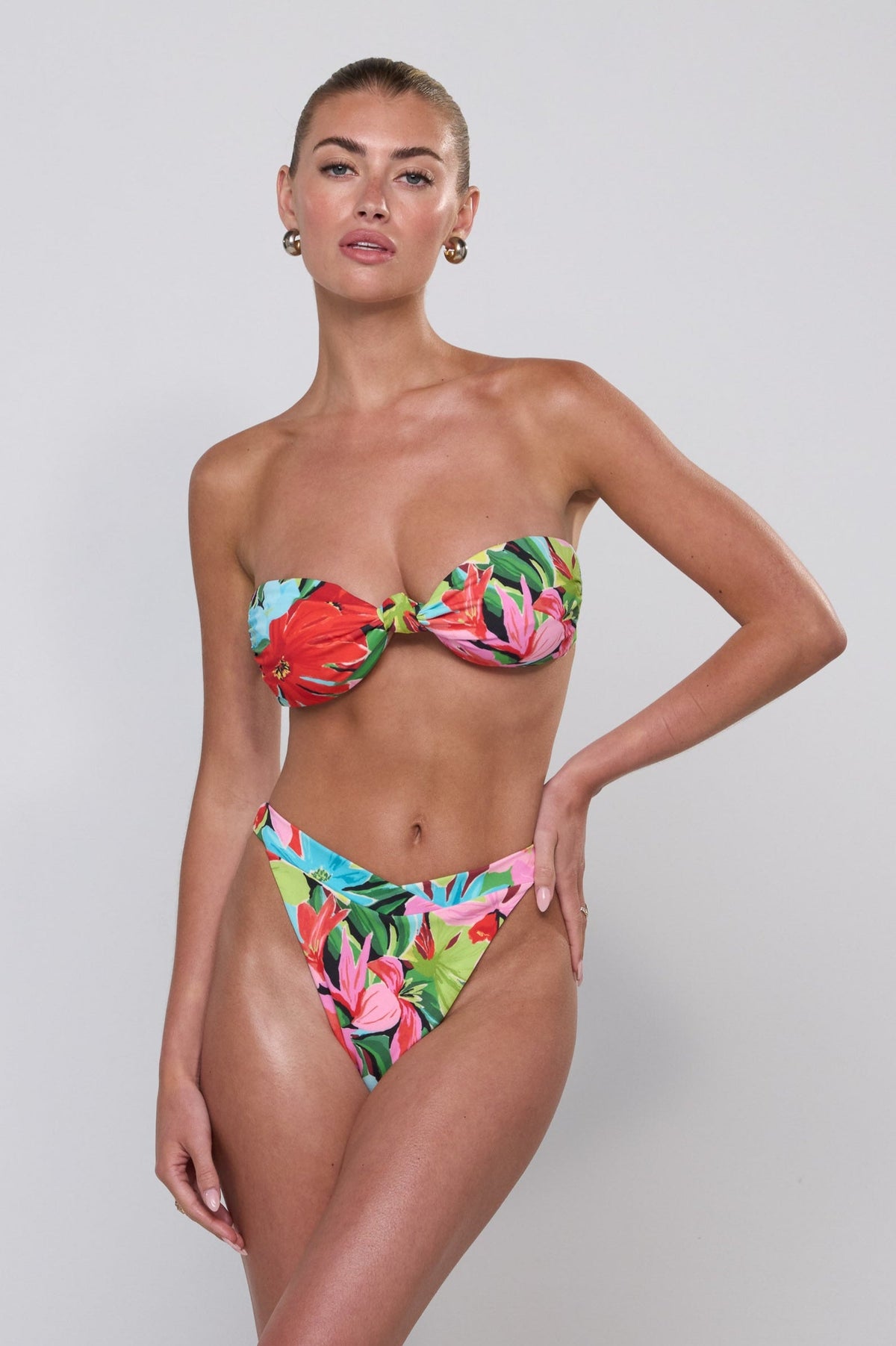 This is an image of Betsy Bikini Bottom in Tropicana - RESA featuring a model wearing the dress