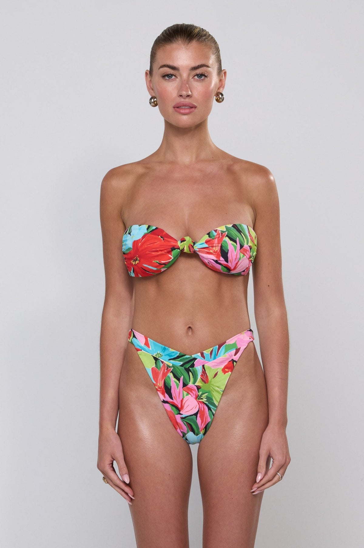 This is an image of Betsy Bikini Bottom in Tropicana - RESA featuring a model wearing the dress