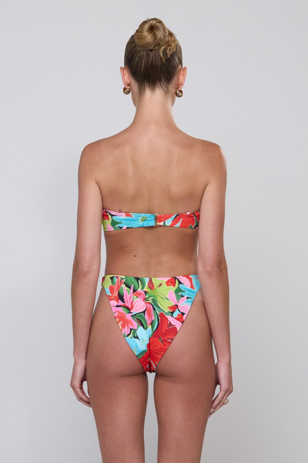 This is an image of Betsy Bikini Bottom in Tropicana - RESA featuring a model wearing the dress