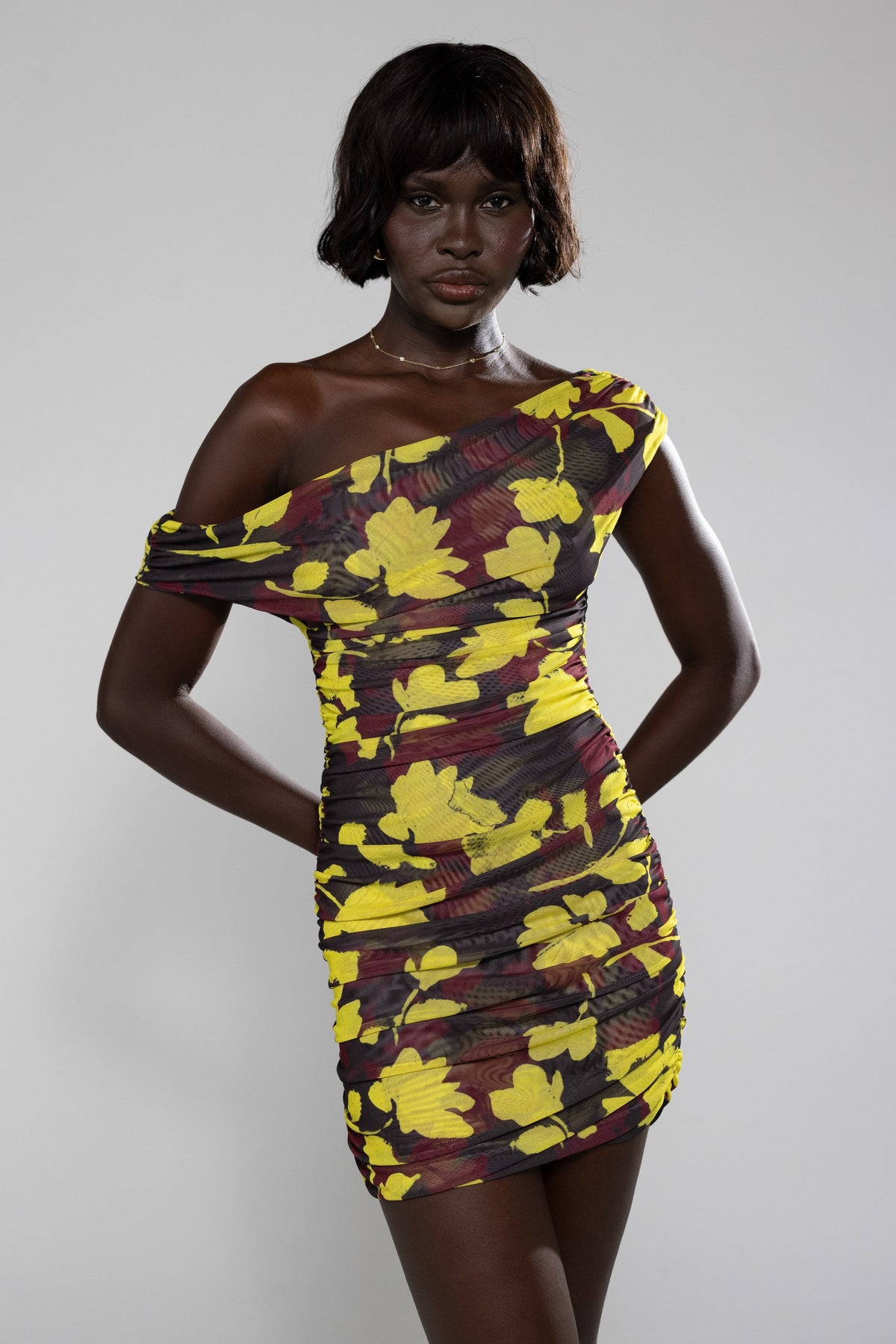 This is an image of Beverly Mini in Sangria - RESA featuring a model wearing the dress