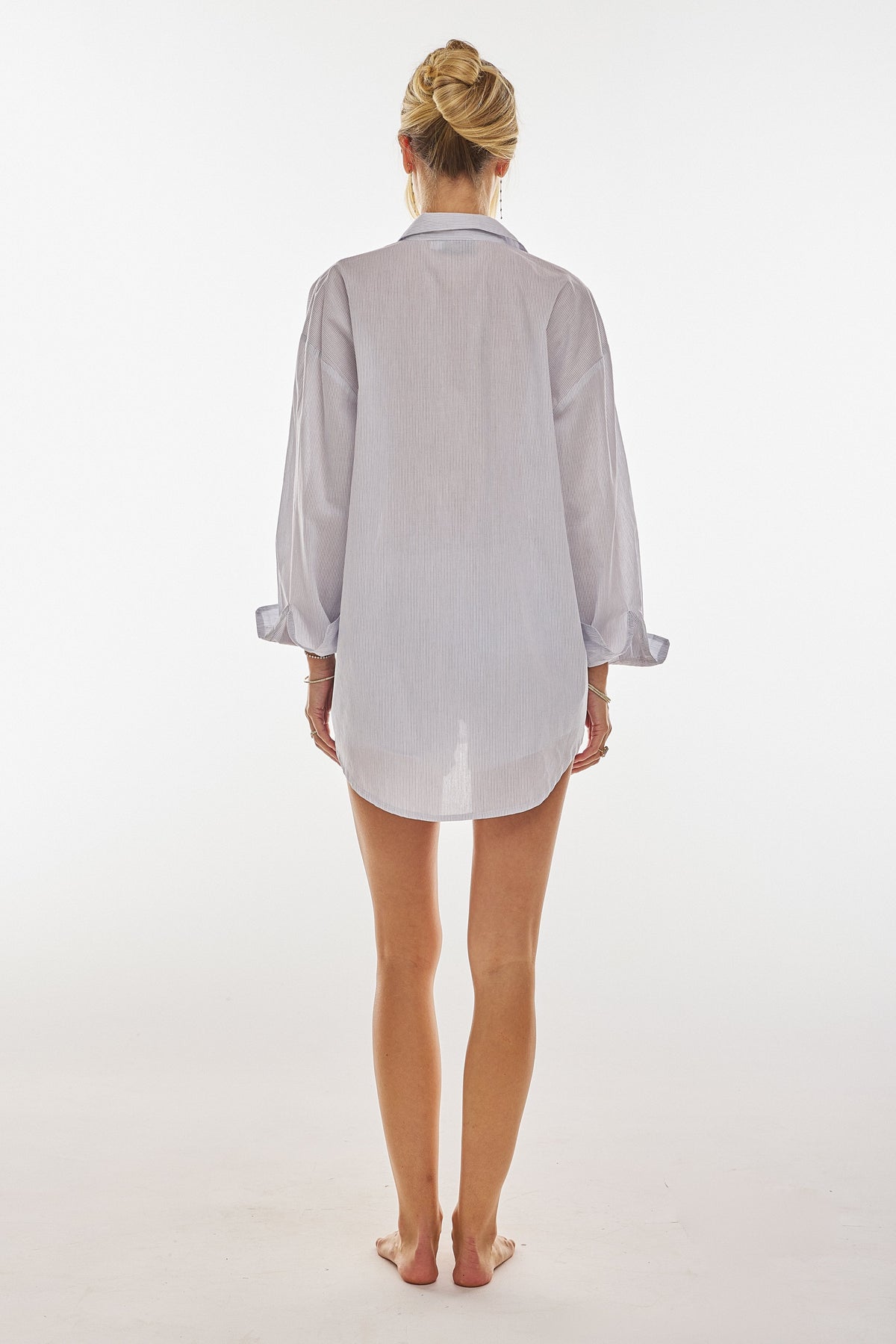 This is an image of Boxer Short in Cloud - RESA featuring a model wearing the dress