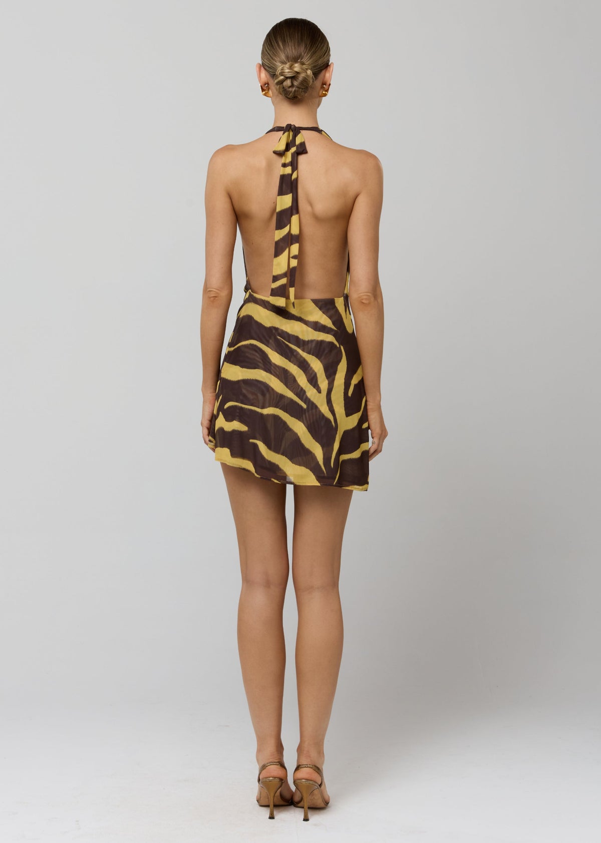 This is an image of Bruna Dress in Raja - RESA featuring a model wearing the dress