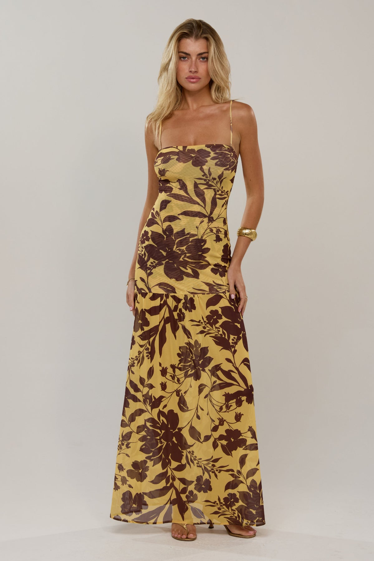 This is an image of Bryanna in Mesa - RESA featuring a model wearing the dress