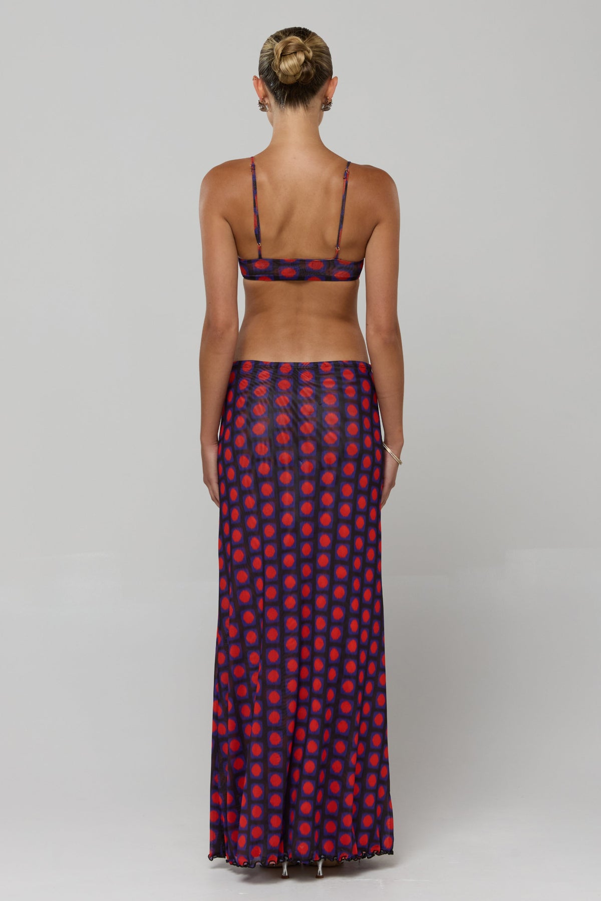 This is an image of Caro Set in Mod - RESA featuring a model wearing the dress