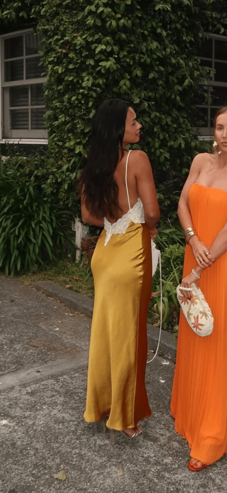 This is an image of Celine Dress in Gold - RESA featuring a model wearing the dress