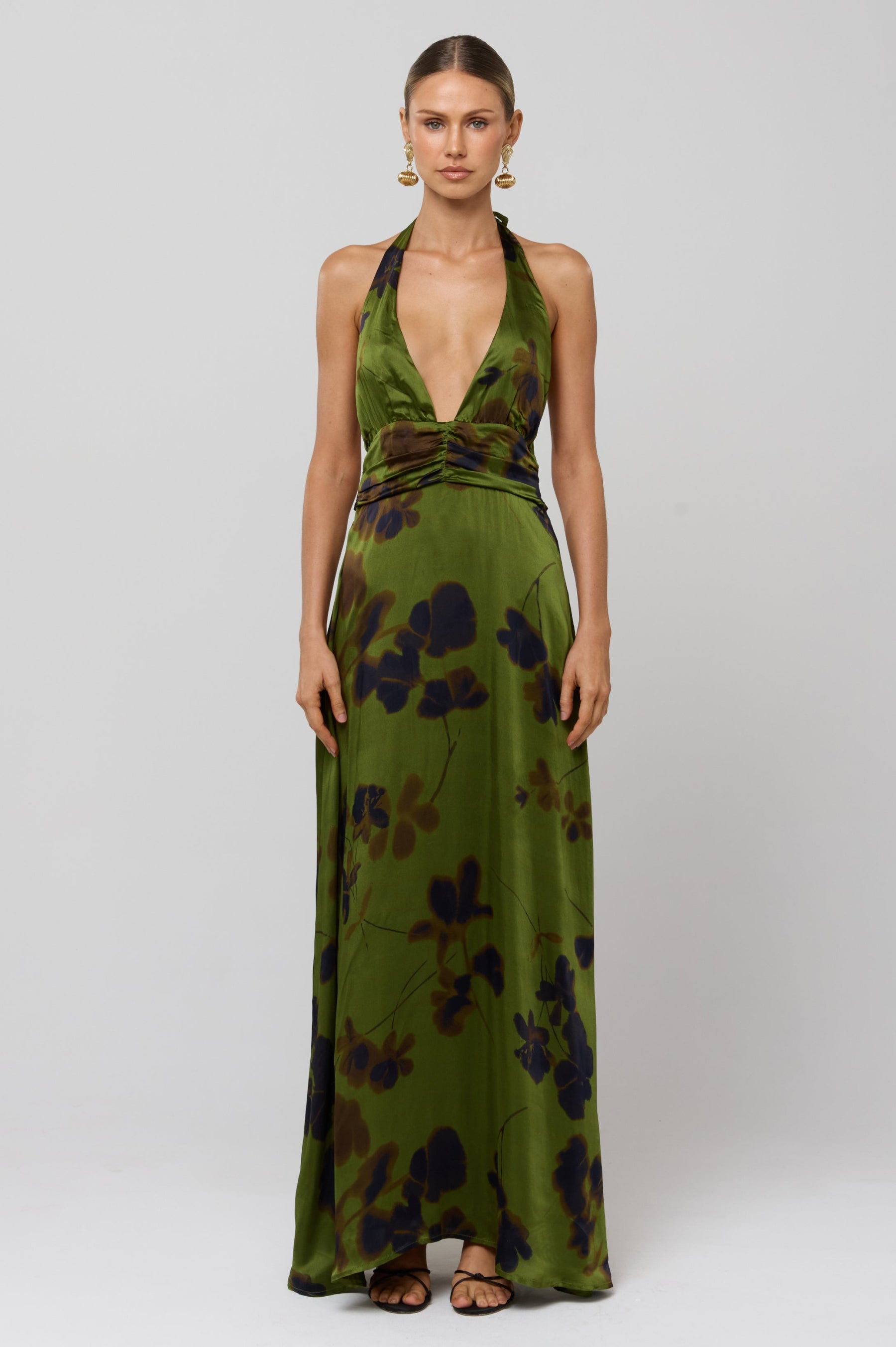 This is an image of Chelsea Dress in Evergreen - RESA featuring a model wearing the dress