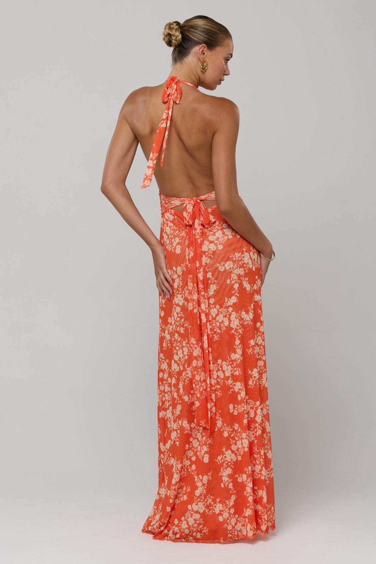 This is an image of Chelsea Dress in Orange Blossom - RESA featuring a model wearing the dress