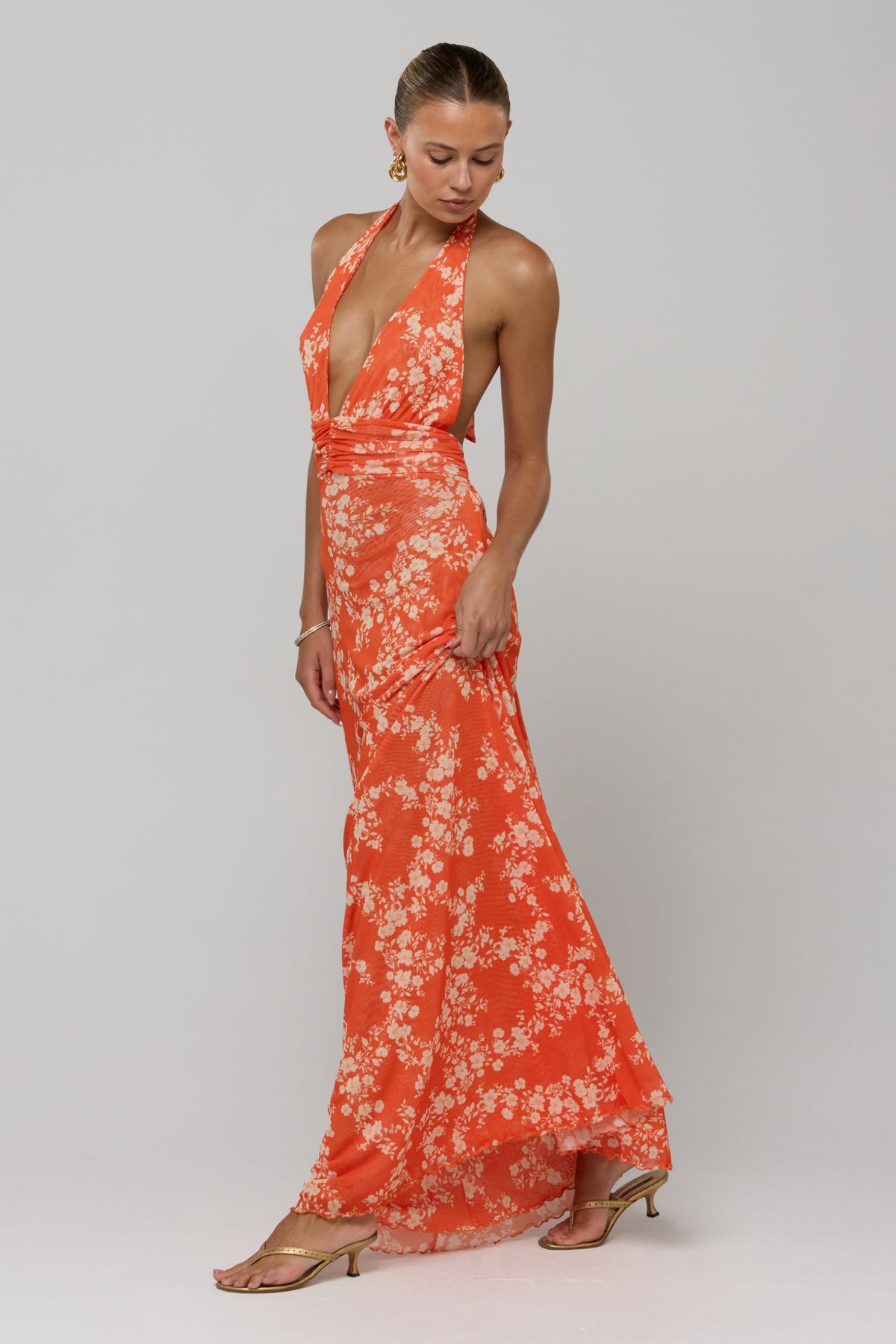 This is an image of Chelsea Dress in Orange Blossom - RESA featuring a model wearing the dress