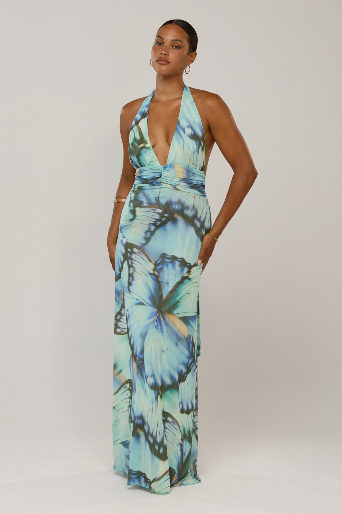 This is an image of Chelsea in Mariposa - RESA featuring a model wearing the dress