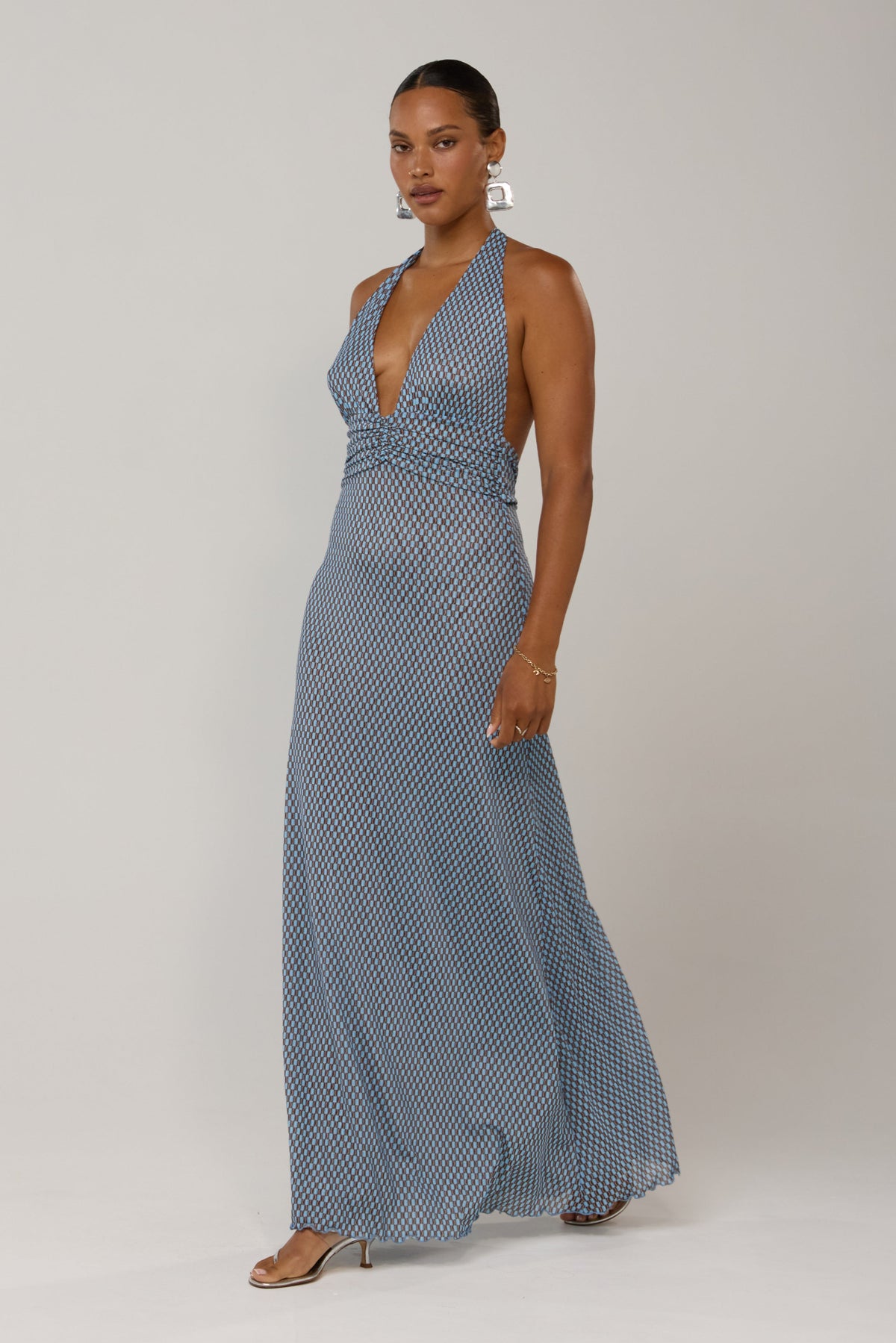 This is an image of Chelsea in Swell - RESA featuring a model wearing the dress
