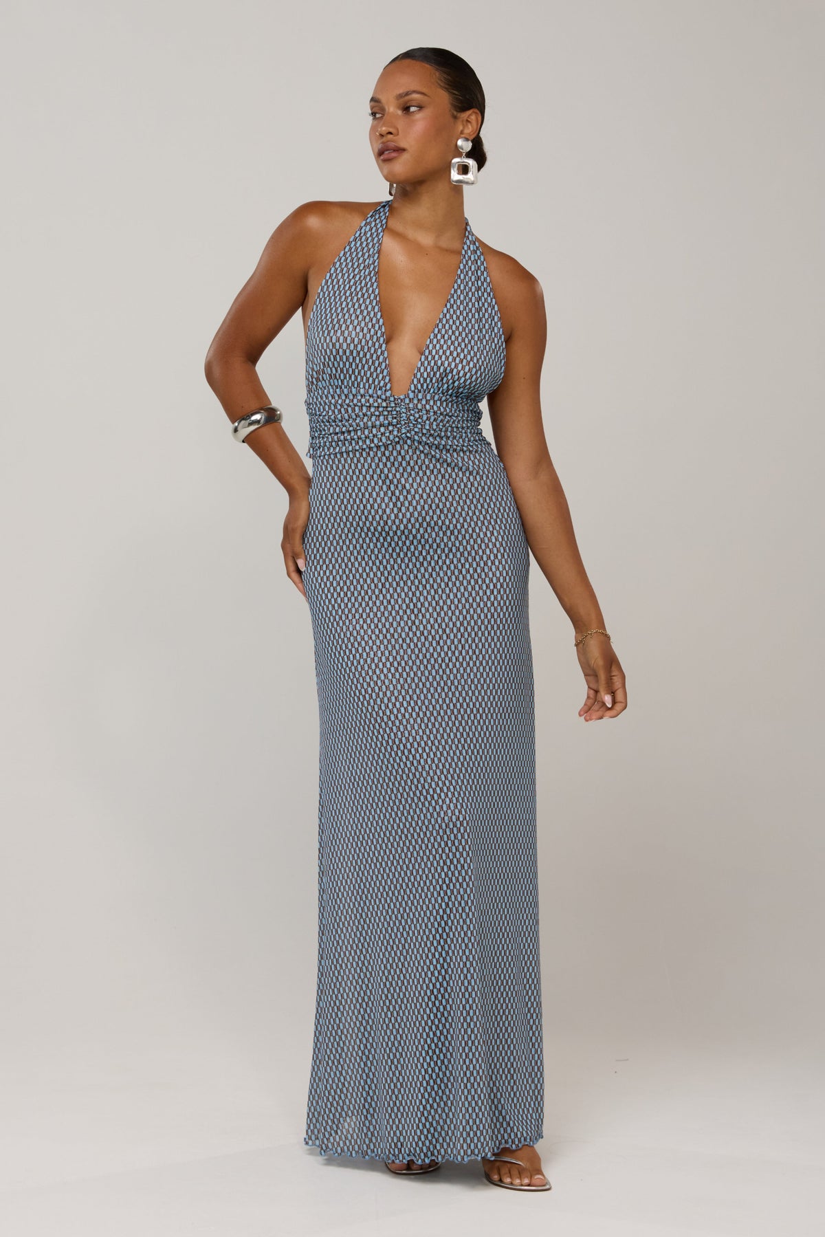 This is an image of Chelsea in Swell - RESA featuring a model wearing the dress