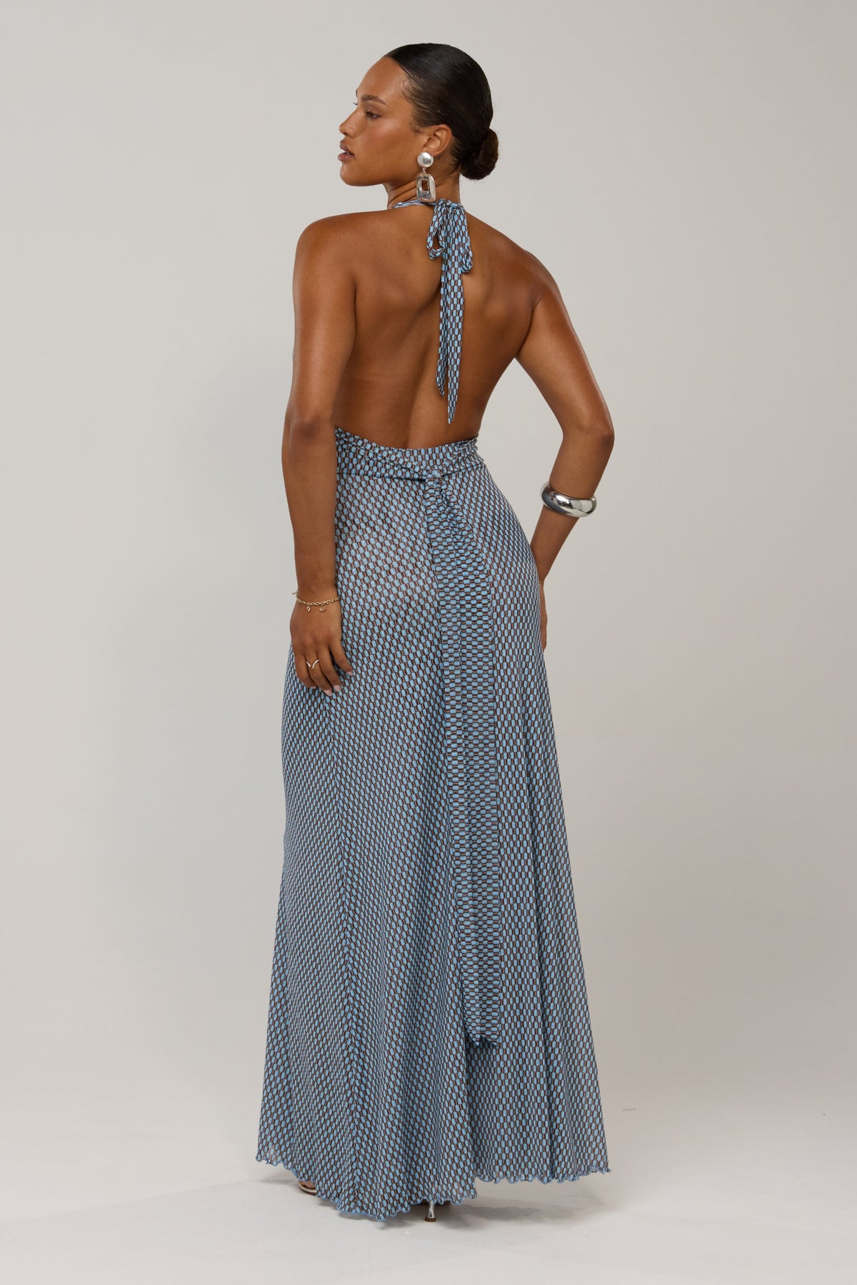 This is an image of Chelsea in Swell - RESA featuring a model wearing the dress