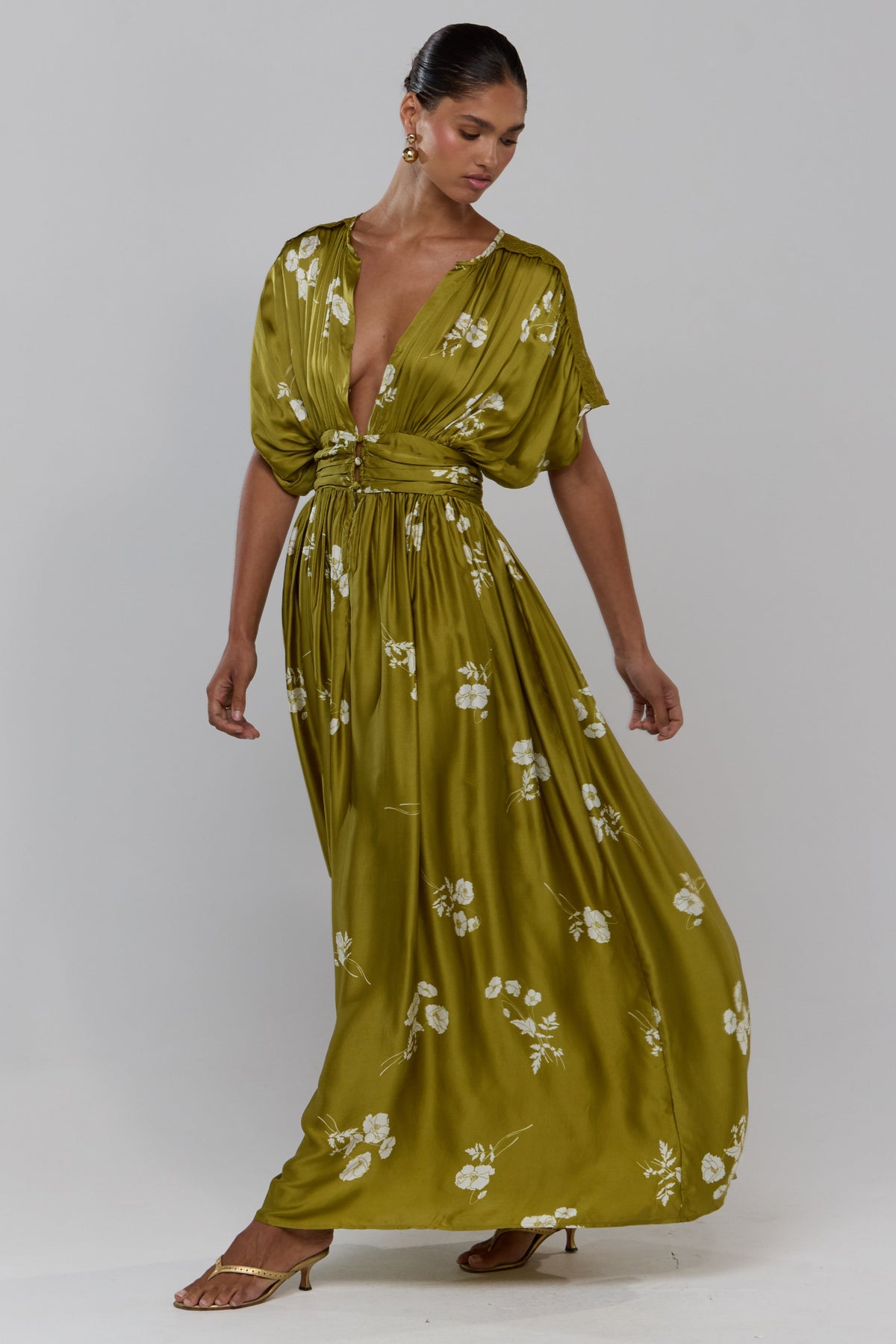 This is an image of Cher in Moss - RESA featuring a model wearing the dress