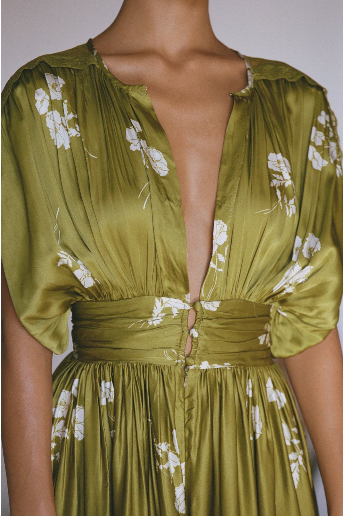 This is an image of Cher in Moss - RESA featuring a model wearing the dress