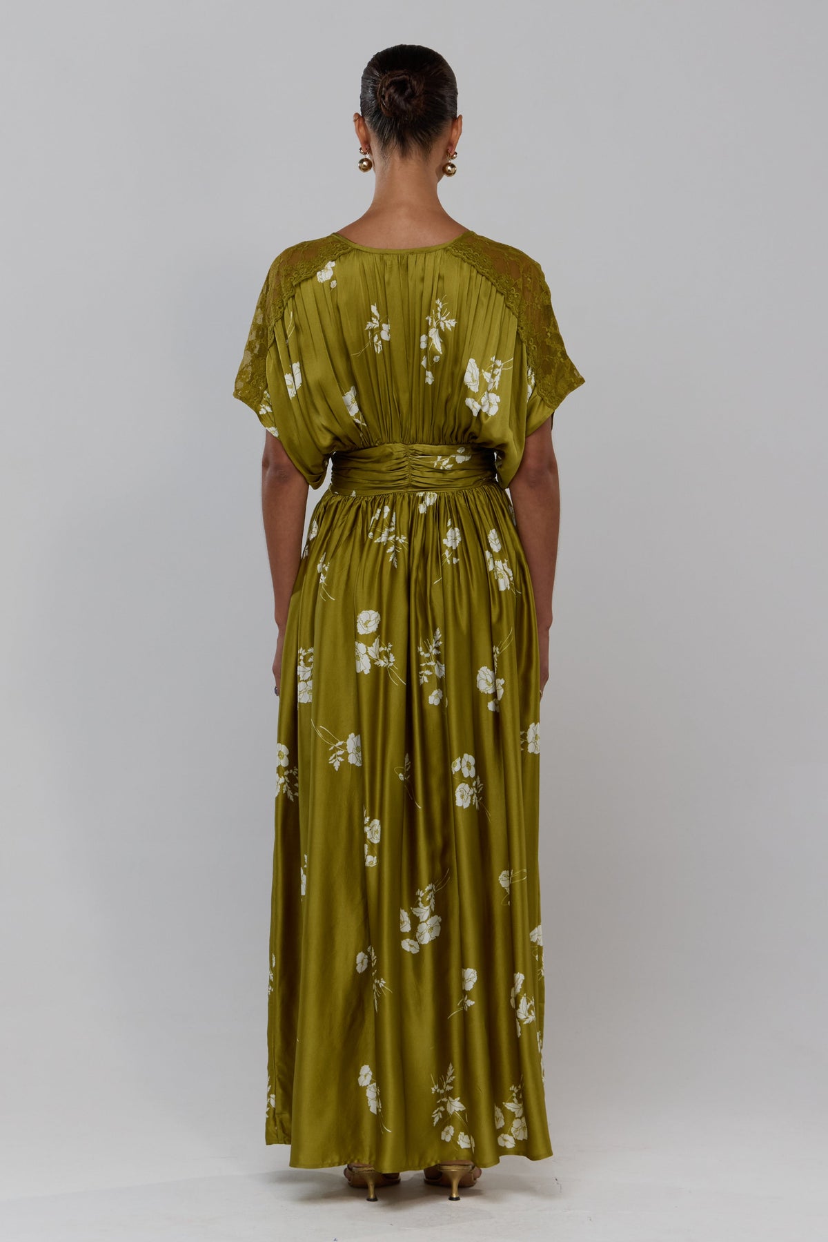 This is an image of Cher in Moss - RESA featuring a model wearing the dress