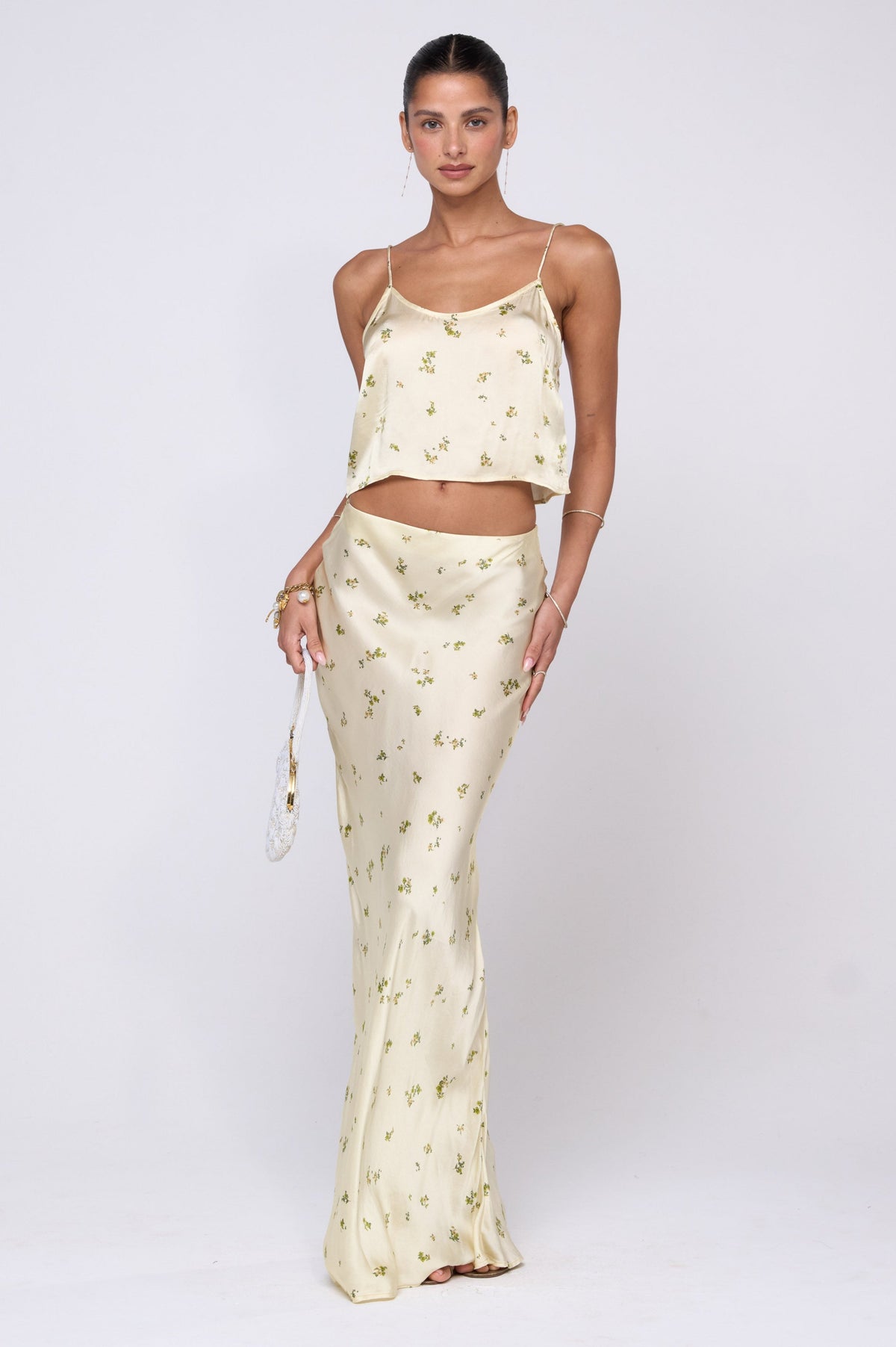This is an image of Claire Top in Beurre - RESA featuring a model wearing the dress