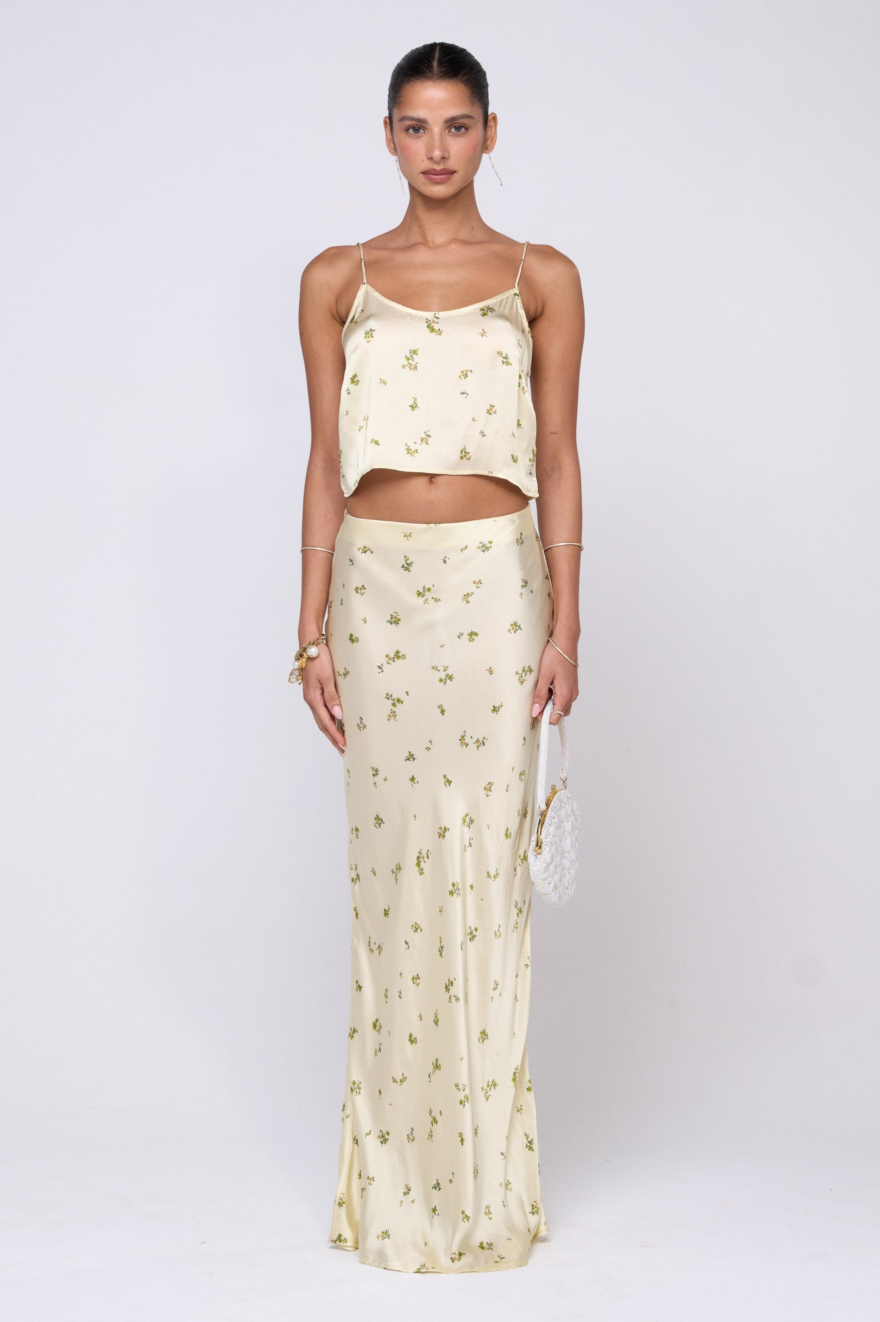This is an image of Claire Top in Beurre - RESA featuring a model wearing the dress